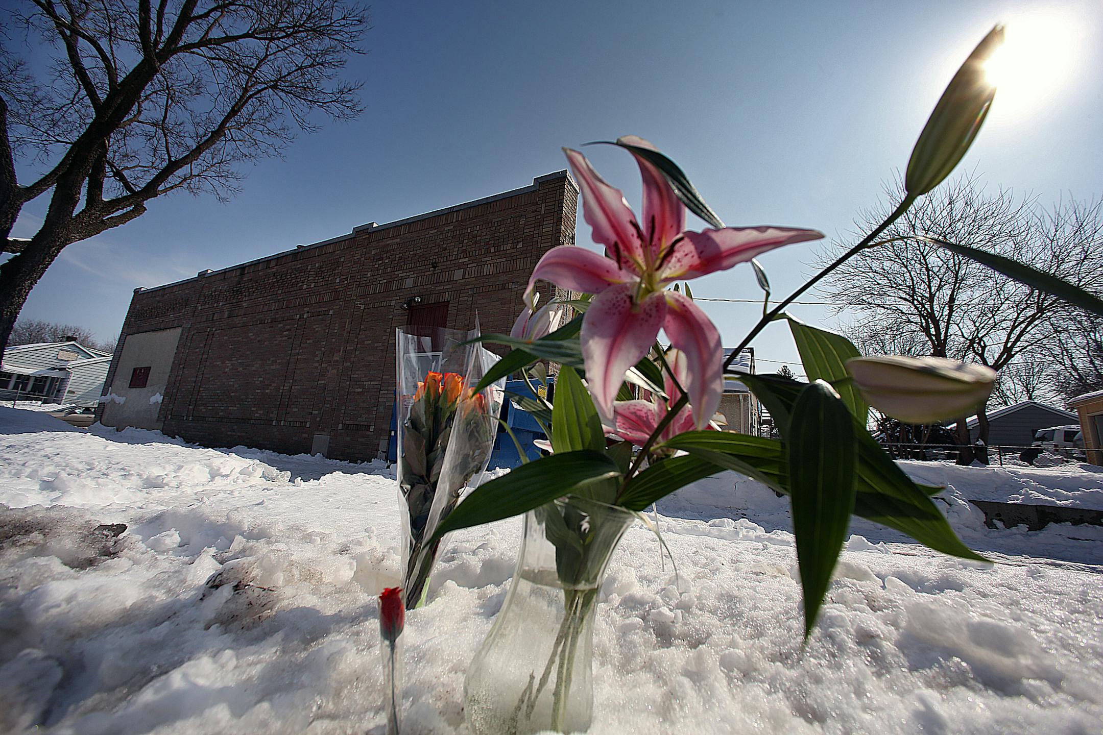 Flowers were left outside the building where the shootings took place, where a makeshift memorial has begun to take shape. ] JIM GEHRZ‚Ä¢jgehrz@startribune.com (JIM GEHRZ/STAR TRIBUNE) / March 8, 2013 / 1:30 PM Minneapolis, MN- BACKGROUND INFORMATION: Two men were killed and one wounded in 3 a.m. shooting at an after-hours establishment in north Minneapolis at the corner of 39th Ave. and Fremont Av. N.