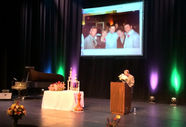 Brian Ribnick, Anarae Schunk's junior high school chess coach, mentor and friend, spoke at a celebration of her life Sunday at the Burnsville Performi