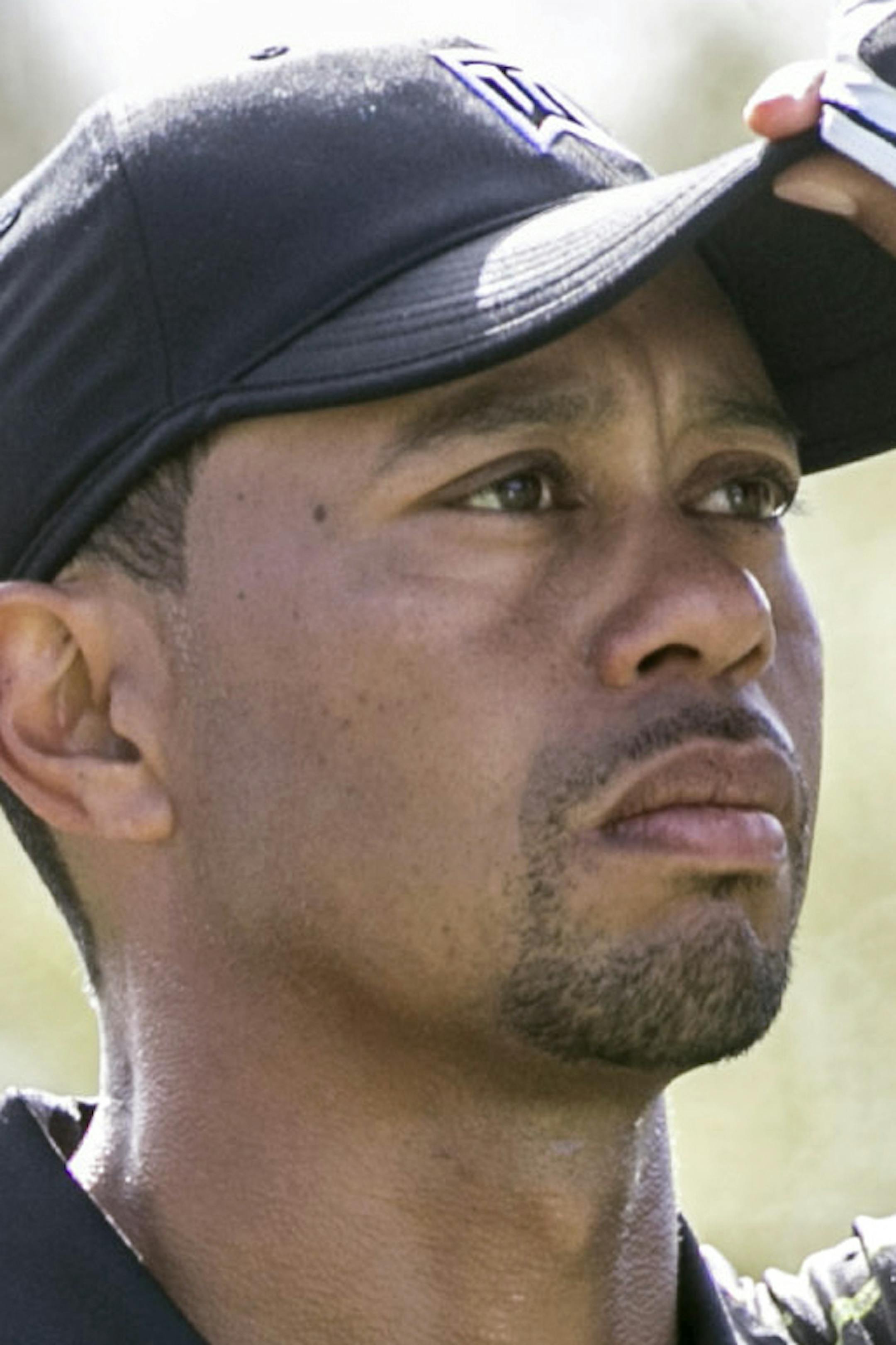 Tiger Woods checked out the course from the third tee during the first round of the Hero World Challenge golf tournament on Thursday.