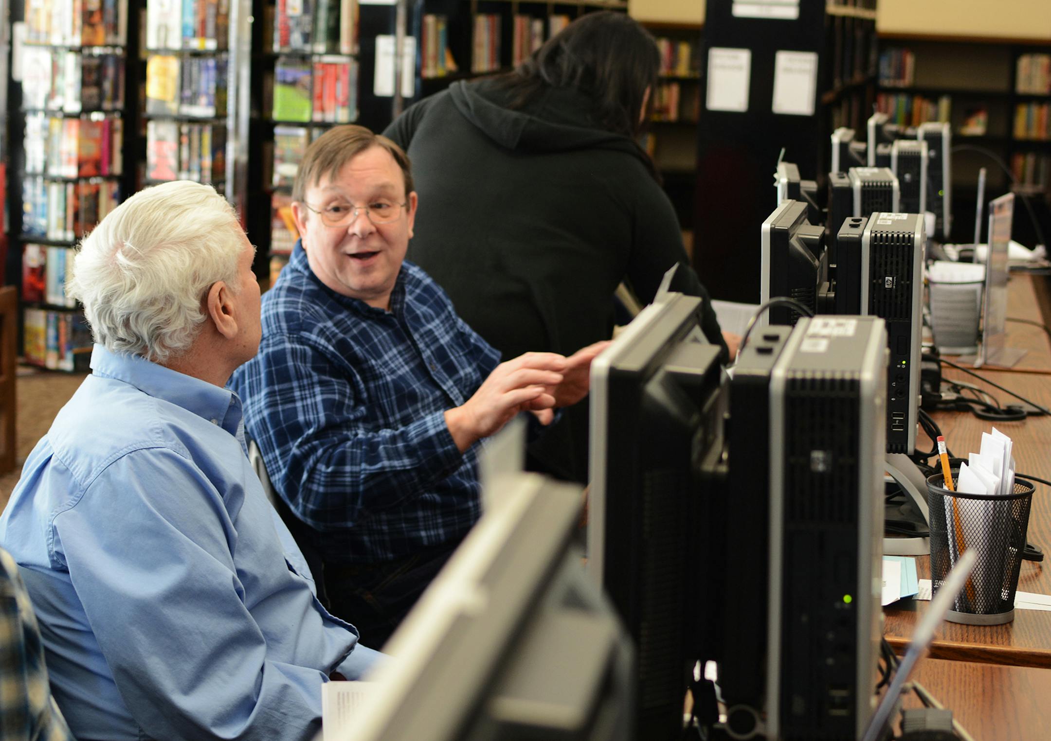 (left to right) Joe Berzak and Steve Kondrick, both of Columbia Heights, chatted during a Senior Surf Day class. Photo by Liz Rolfsmeier, Special to the Star Tribune