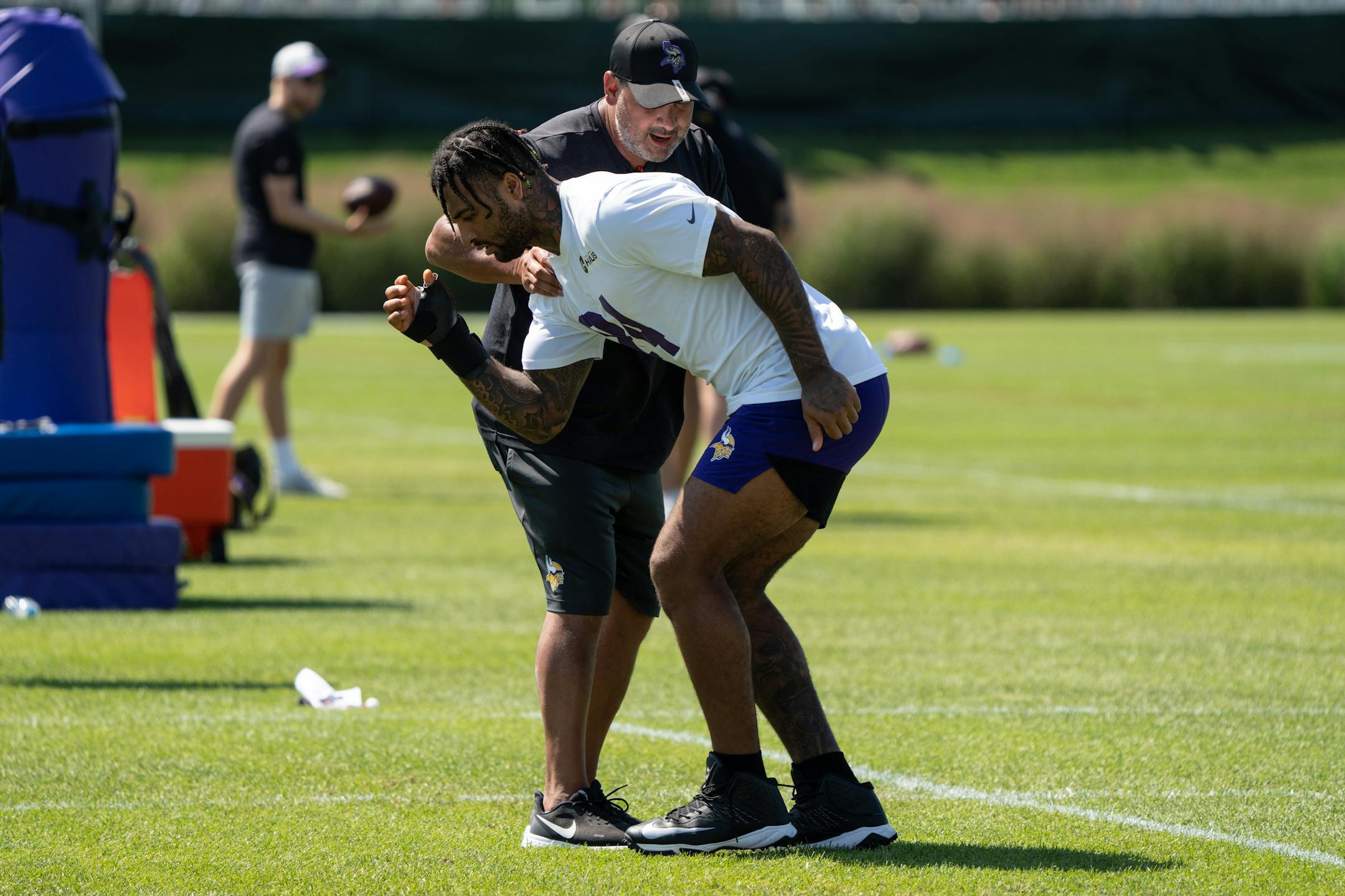 Vikings tight end Irv Smith Jr. works with a trainer during Vikings Training Camp.