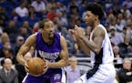 Andre Miller, left, played for Sacramento and Washington last season. He joins the Timberwolves to add a veteran's presence at point guard.