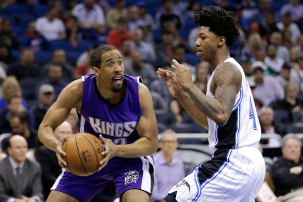 Andre Miller, left, played for Sacramento and Washington last season. He joins the Timberwolves to add a veteran's presence at point guard.