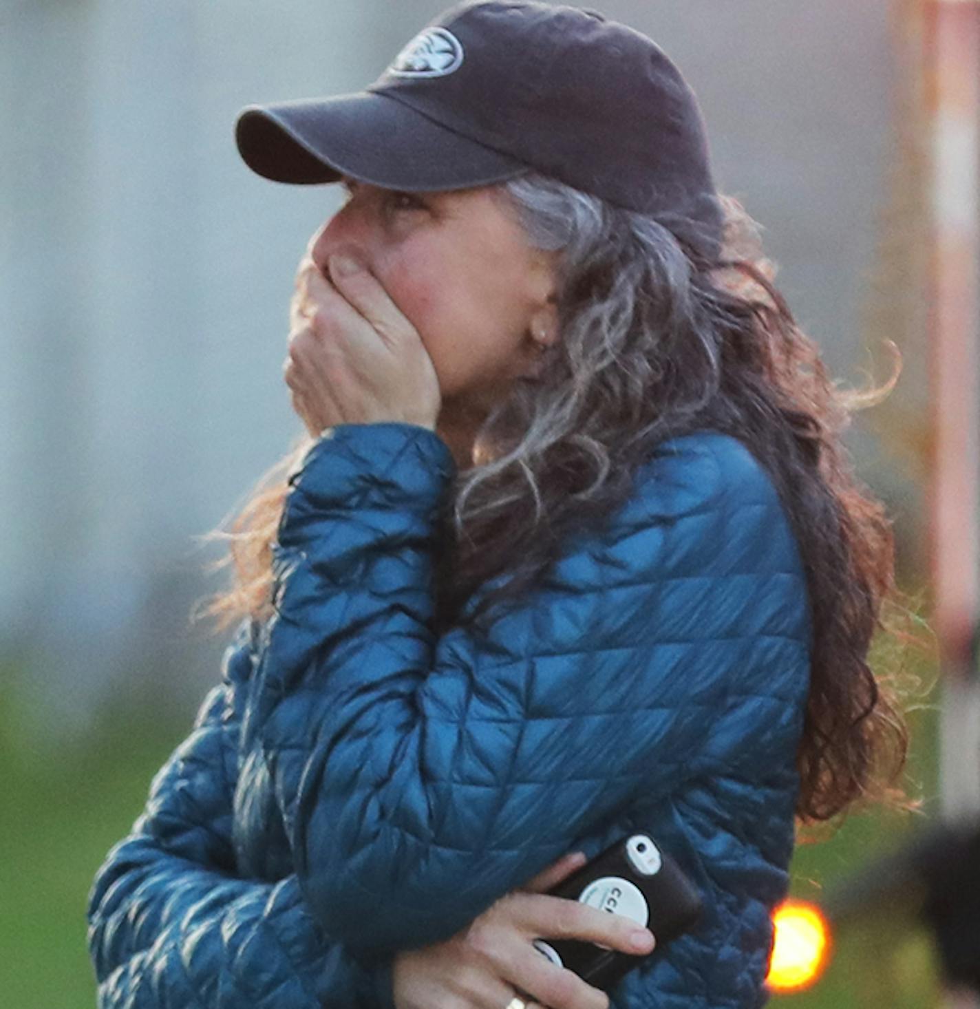 Athena Priest reacts as she views the fire destroyed Lola following an early morning fire at Lola on bde maka ska Thursday, May 16, 2019, in Minneapolis, MN. Priest and her husband Sheff ran Tin Fish, a restaurant that was in the same building as Lola for 14 years. "We raised a lot of kids in that building," Priest said, referring to young workers they hired who worked there growing up.] DAVID JOLES &#x2022; david.joles@startribune.com Early morning fire, apparently sparked by lightning, destroy