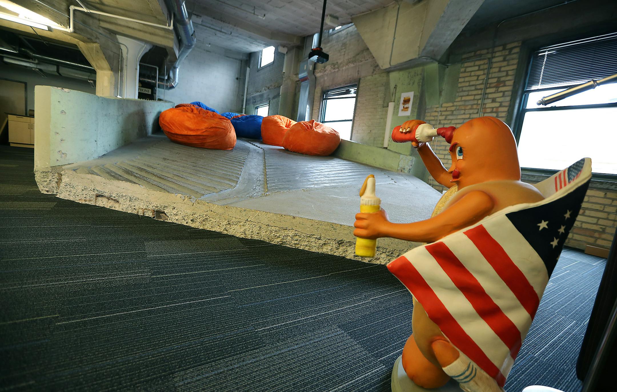 One of the meeting areas include bean bags on what was once a parking ramp at Broadhead, Friday, November 20, 2015 in downtown Minneapolis, MN. The Minneapolis-based marketing agency has announced that with three specialist sister companies it will form the b+co. group. ] (ELIZABETH FLORES/STAR TRIBUNE) ELIZABETH FLORES • eflores@startribune.com