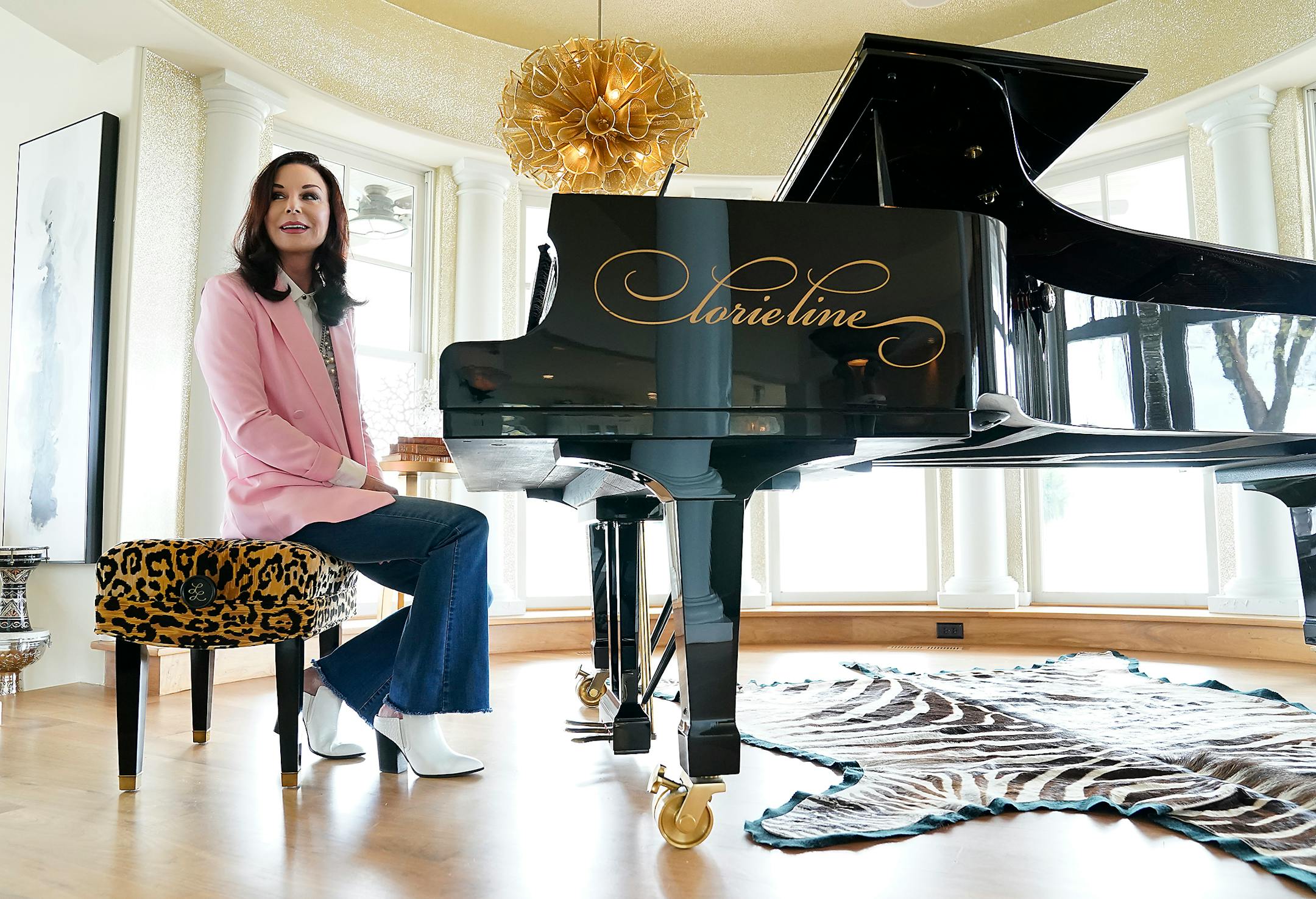 The Yamaha concert grand piano is the same one Lorie Line's fans would see in the concerts that she played all through the Midwest. "This house was built around the piano," Line said.