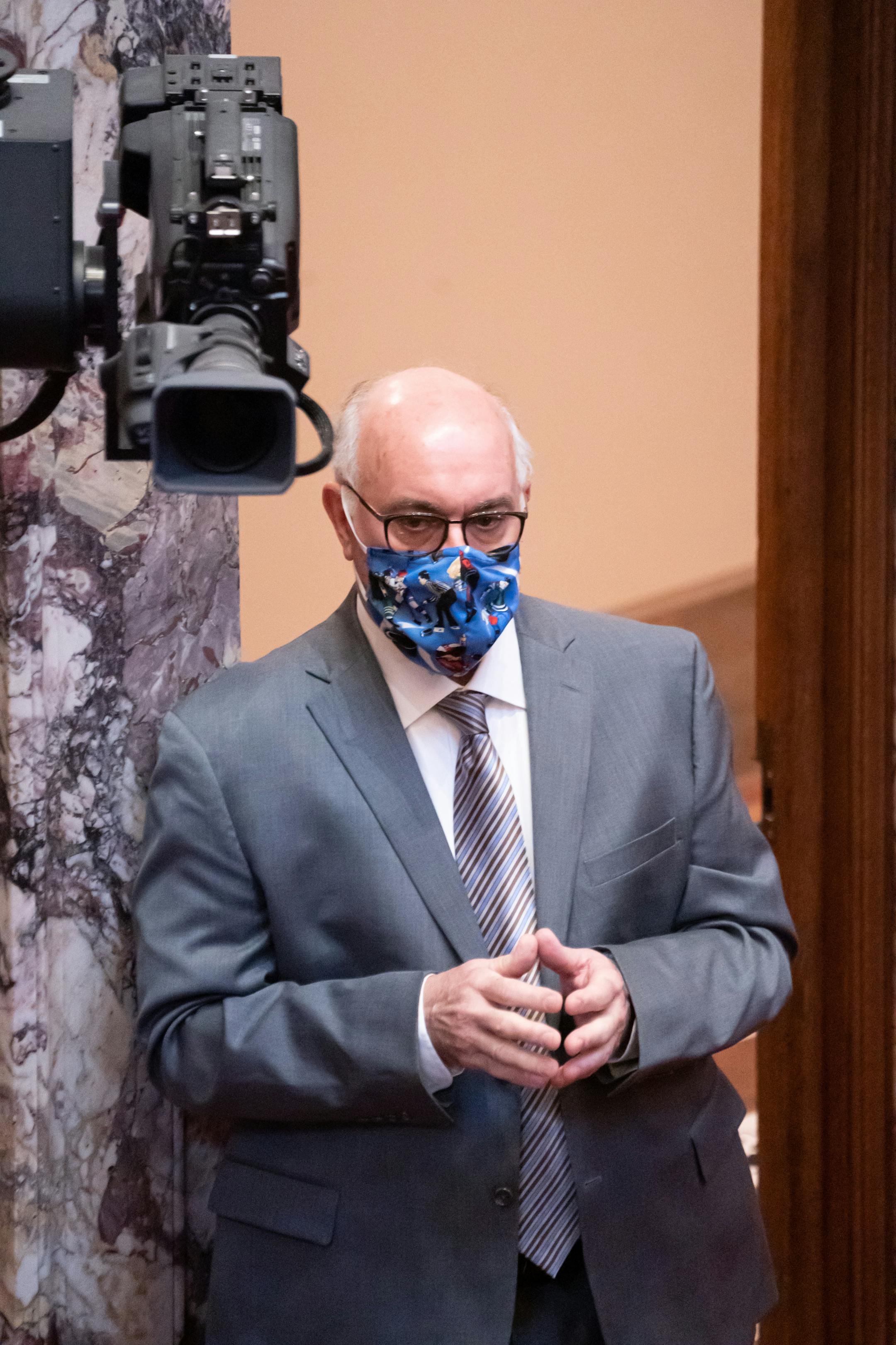 Sen. David Tomassoni, DFL-Chisholm waited by a side door during a floor fight and vote continuing his term as President-ProTem of the Senate. This measure was taken to prevent a Republican being taken as Lt. Governor in the event President Biden chooses a Minnesota Senator for a role in his administration.  In Minnesota the Senate President automatically becomes the Lt Governor. This would impact the Republicans thin majority lead.
