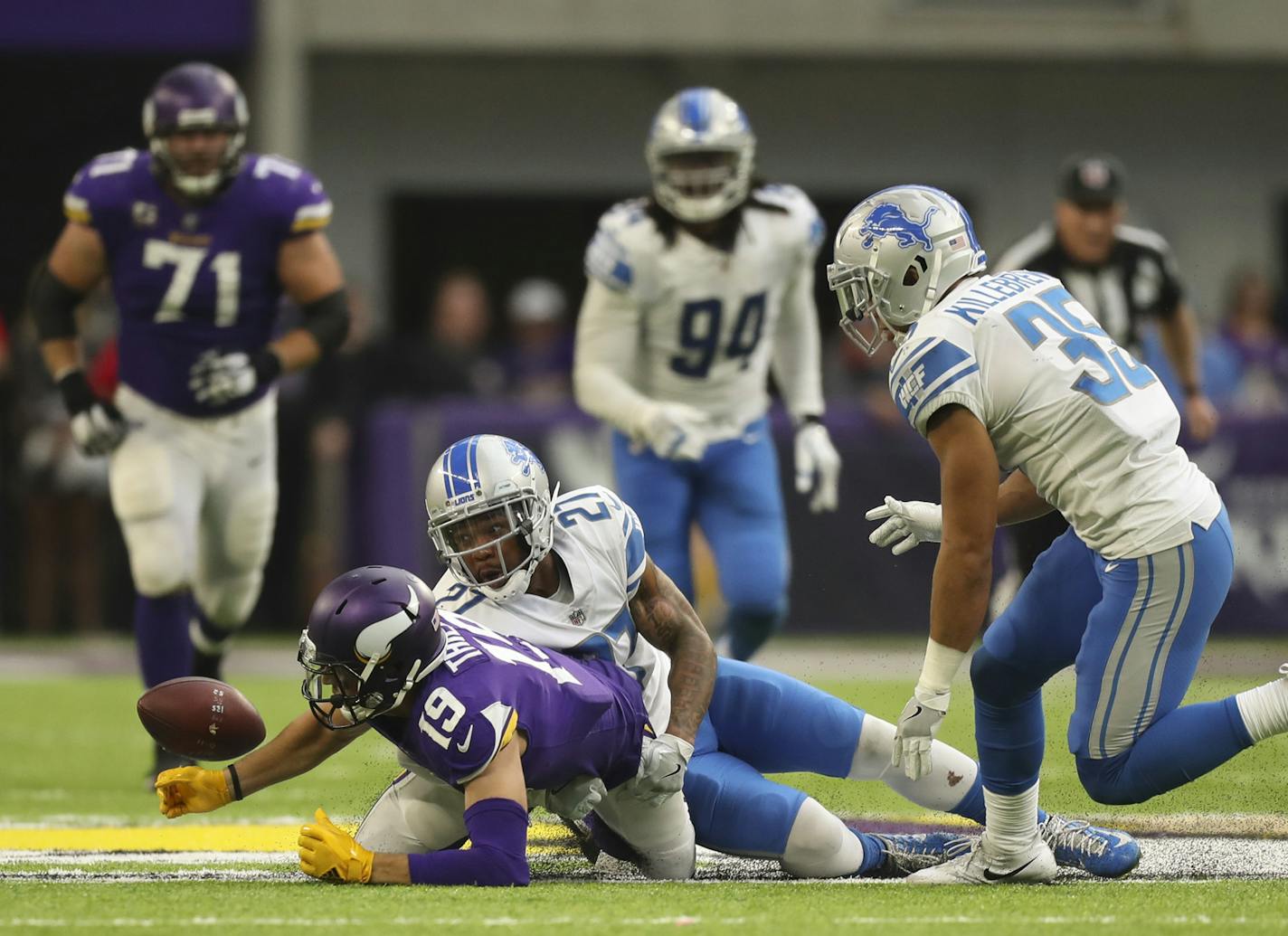 Minnesota Vikings wide receiver Adam Thielen (19) fumbled after making an 11 yard pass reception with under two minutes left in the fourth quarter, sealing the Vikings' loss when Detroit Lions middle linebacker Tahir Whitehead, left, recovered it. ] JEFF WHEELER &#xef; jeff.wheeler@startribune.com The Minnesota Vikings lost to the Detroit Lions 14-7 Sunday afternoon, October 1, 2017 at U.S. Bank Stadium in Minneapolis.