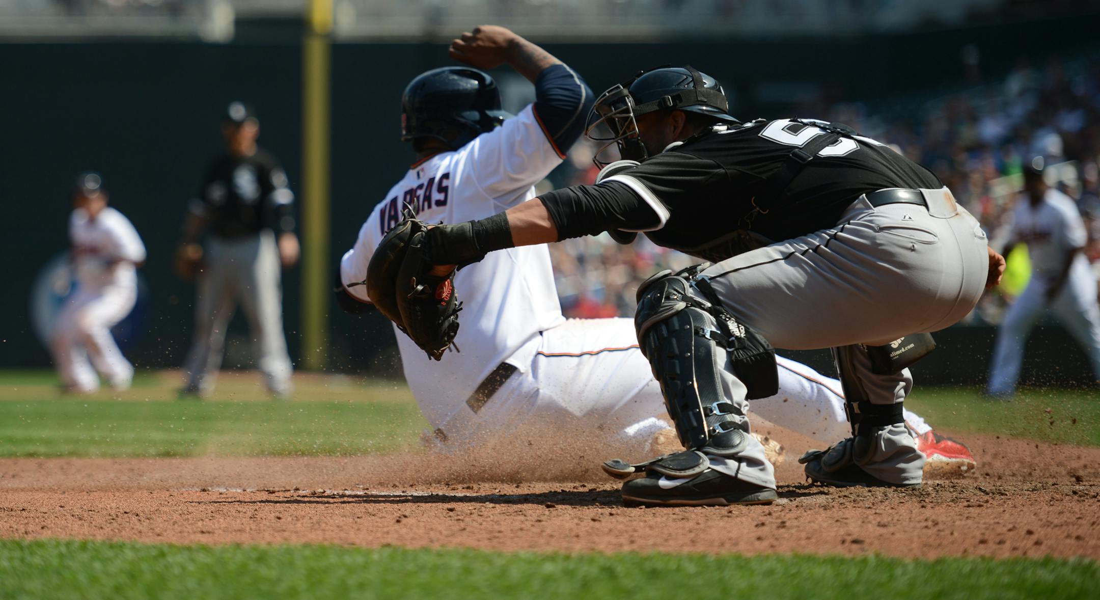 Twins infielder Kennys Vargas slides into home ] Mark Vancleave - mark.vancleave@startribune.com * The Minnesota Twins play the Chicago White Sox at Target Field on Sunday, May 3, 2015 in Minneapolis.