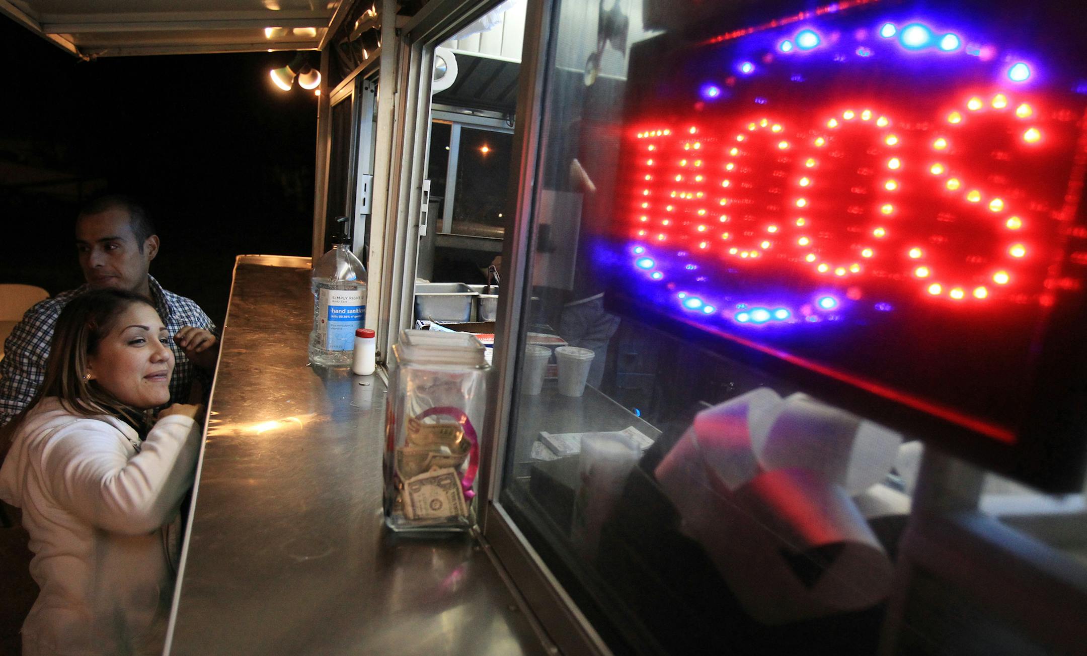 Haydee Muniz, left, and Luis Tello wait for their order at the Fiesta Tacos and More food truck in Corpus Christi, Texas on Nov. 15, 2012. Food trucks are not a new phenomenon, but in recent years their popularity has grown, and culinary variety along with it. There still are the traditional tacos, burgers and snow cones, but mobile eateries now have offerings such as Mediterranean, Asian and Cajun cuisine; waffles, tapas, meatballs and even gourmet macaroni and cheese. Some only serve desserts