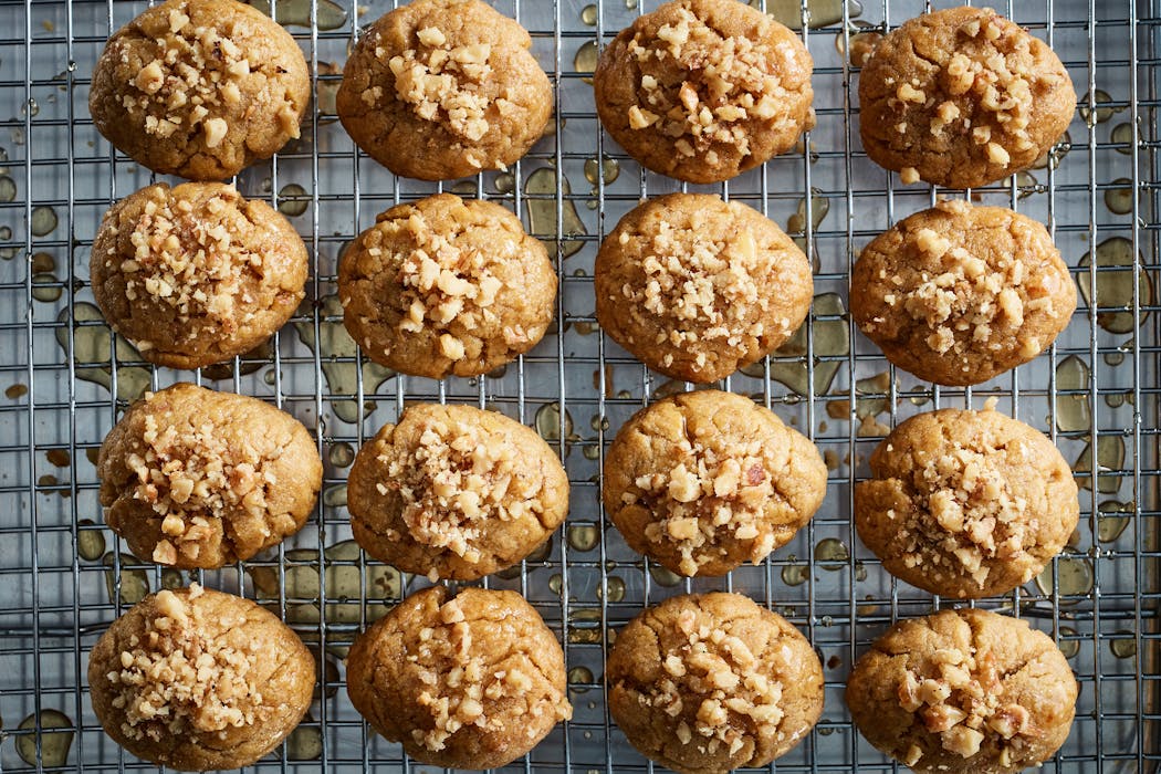 The classic Melomakarona Greek holiday cookies normally call for walnuts, but they can be topped with any nut.