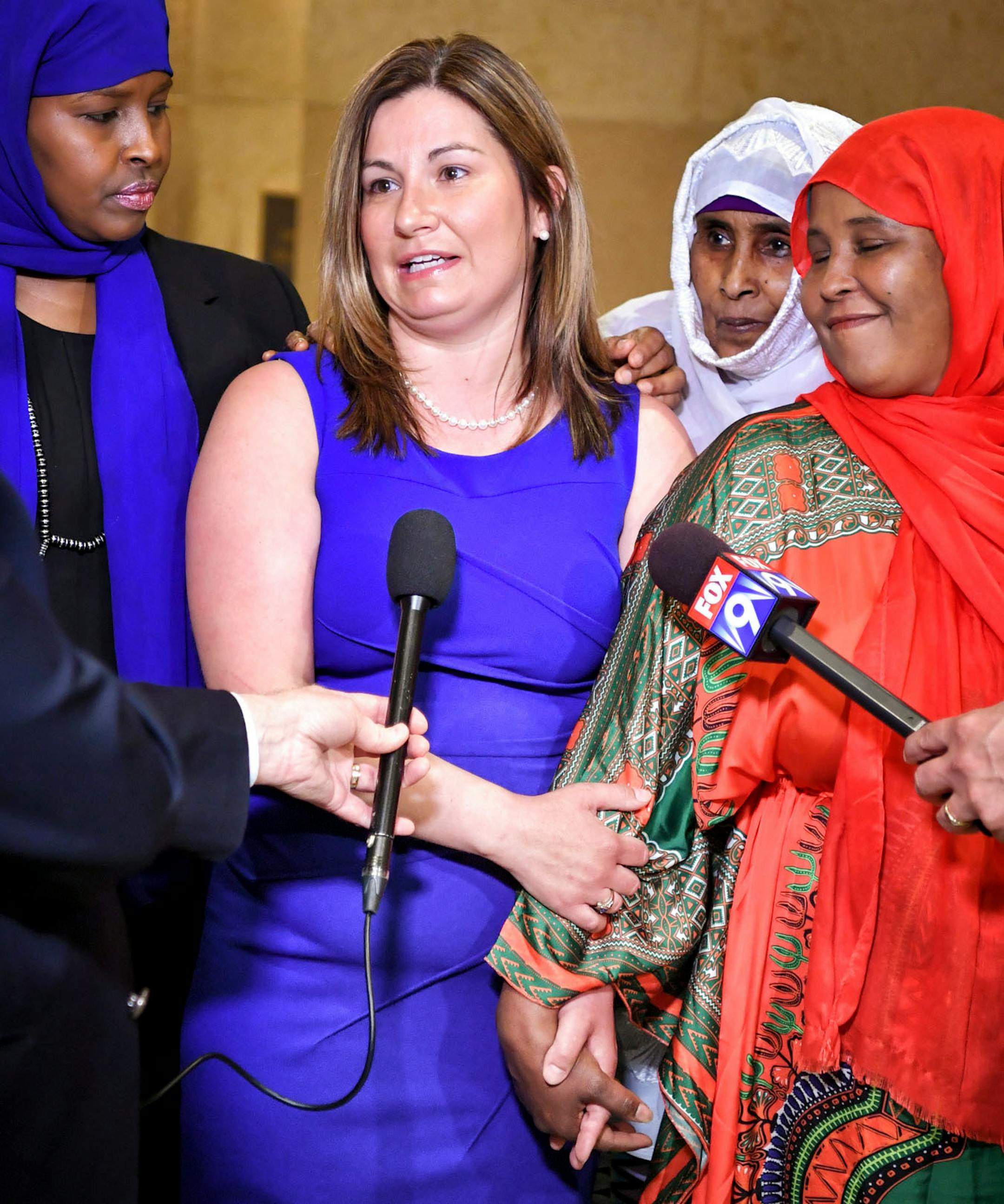 Representative Mary Franson, R-Alexandria, stood holding hands with genital mutilation survivors who supported her bill. L to R Farhio Khalif, Ibado Mohamud and Fadumo Abdinur.
