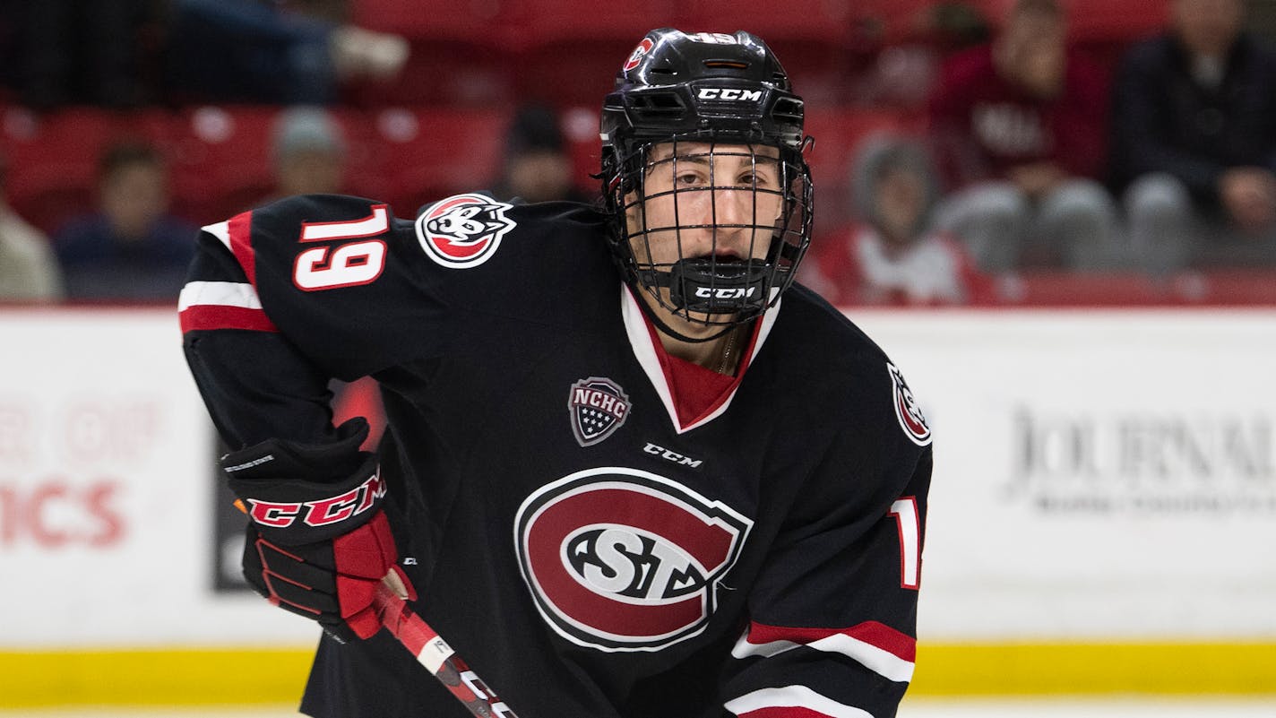 St. Cloud State forward Grant Cruikshank (19) during an NCAA hockey game against Miami OH on Saturday, Dec. 10, 2022 in Oxford, Ohio. (AP Photo/Emilee Chinn)