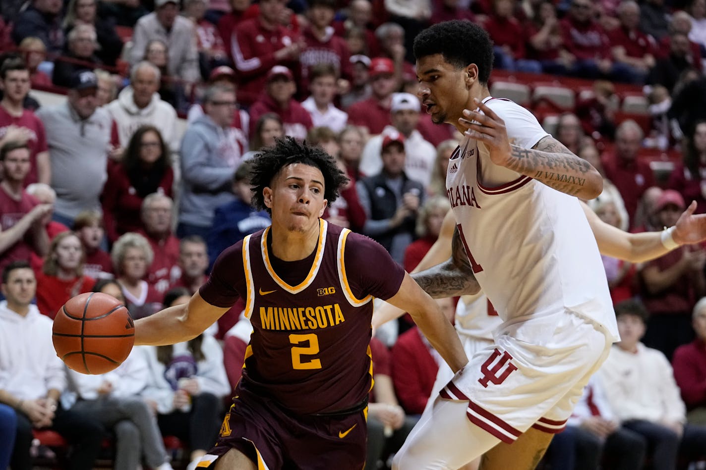 Gophers guard Mike Mitchell Jr. makes a pass against Indiana center Kel'el Ware during Minnesota's 74-62 road loss on Jan. 12.