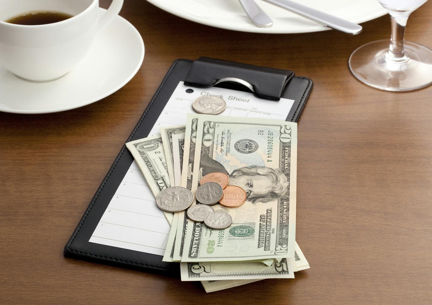 iStockphoto.com
Guest check with Cash and Coin. Tips.