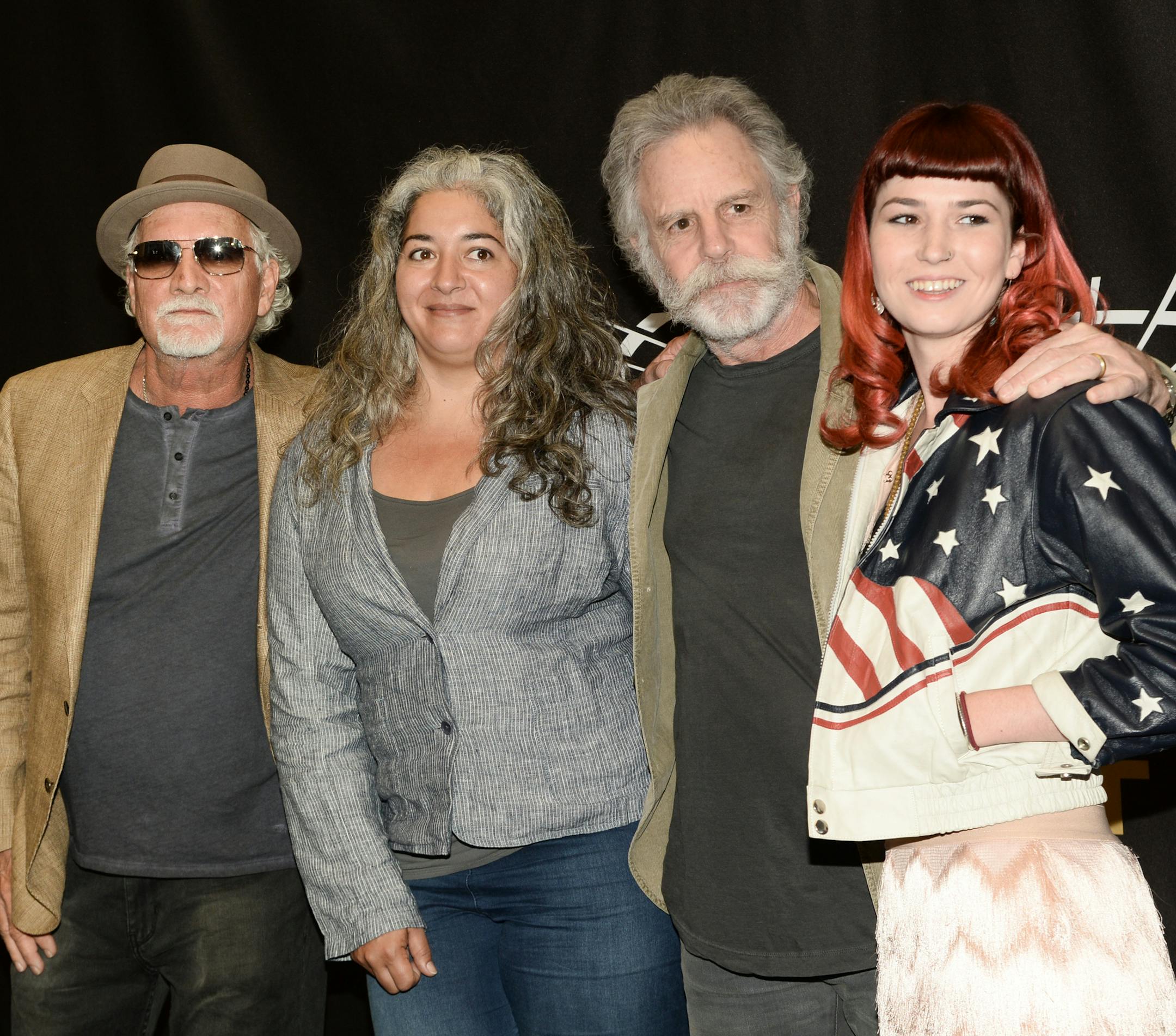 Musicians Bill Kreutzmann, left, and Bob Weir of the Grateful Dead are joined by Trixie Garcia and Reya Hart, right, representing their fathers Jerry Garcia and Mickey Hart, at the Madison Square Garden 2015 Walk of Fame Induction ceremony on Monday, May 11, 2015, in New York. (Photo by Evan Agostini/Invision/AP)