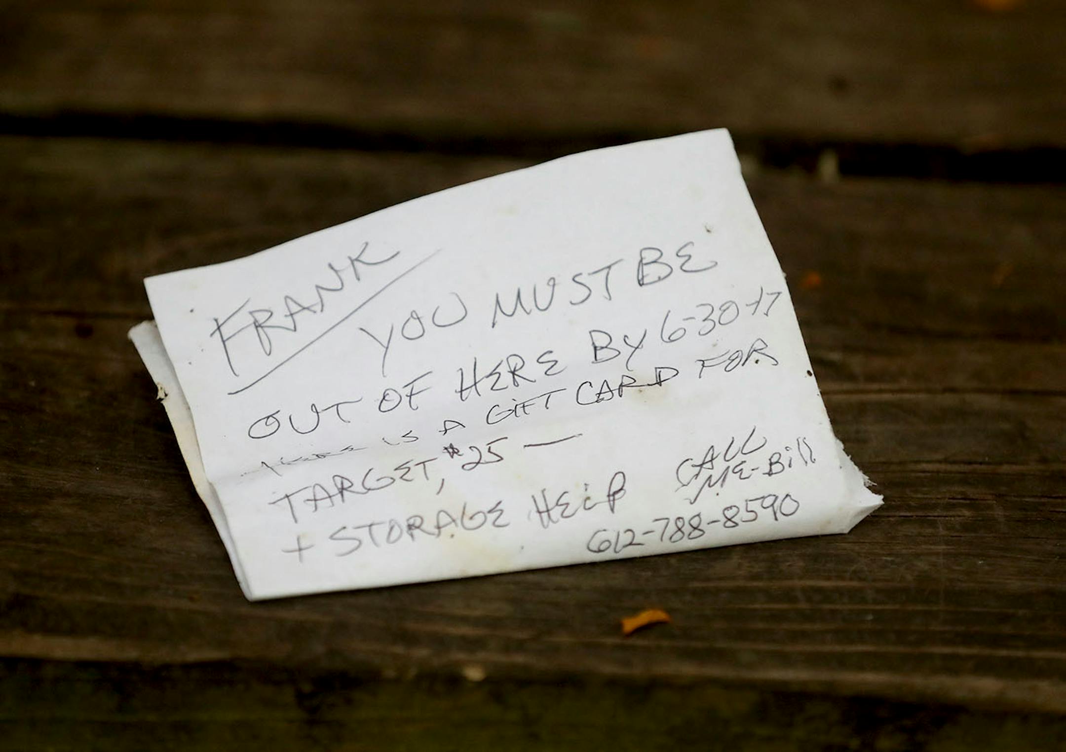 A neighbor of mobile home park resident Frank Adelmann 59, who took his own life days earlier, left this note for Adelmann and it was seen Thursday, June 29, 2017, in St. Anthony, MN. Residents who knew Adelmann say he told them he wasn't leaving Lowry Grove, both due to the condition of his home (it could not be moved) and a lack of options of where he could go next. Lowry Grove closed it's gate and all residents had to be gone by 12 midnight on July 1,with the space slated to be redeveloped in