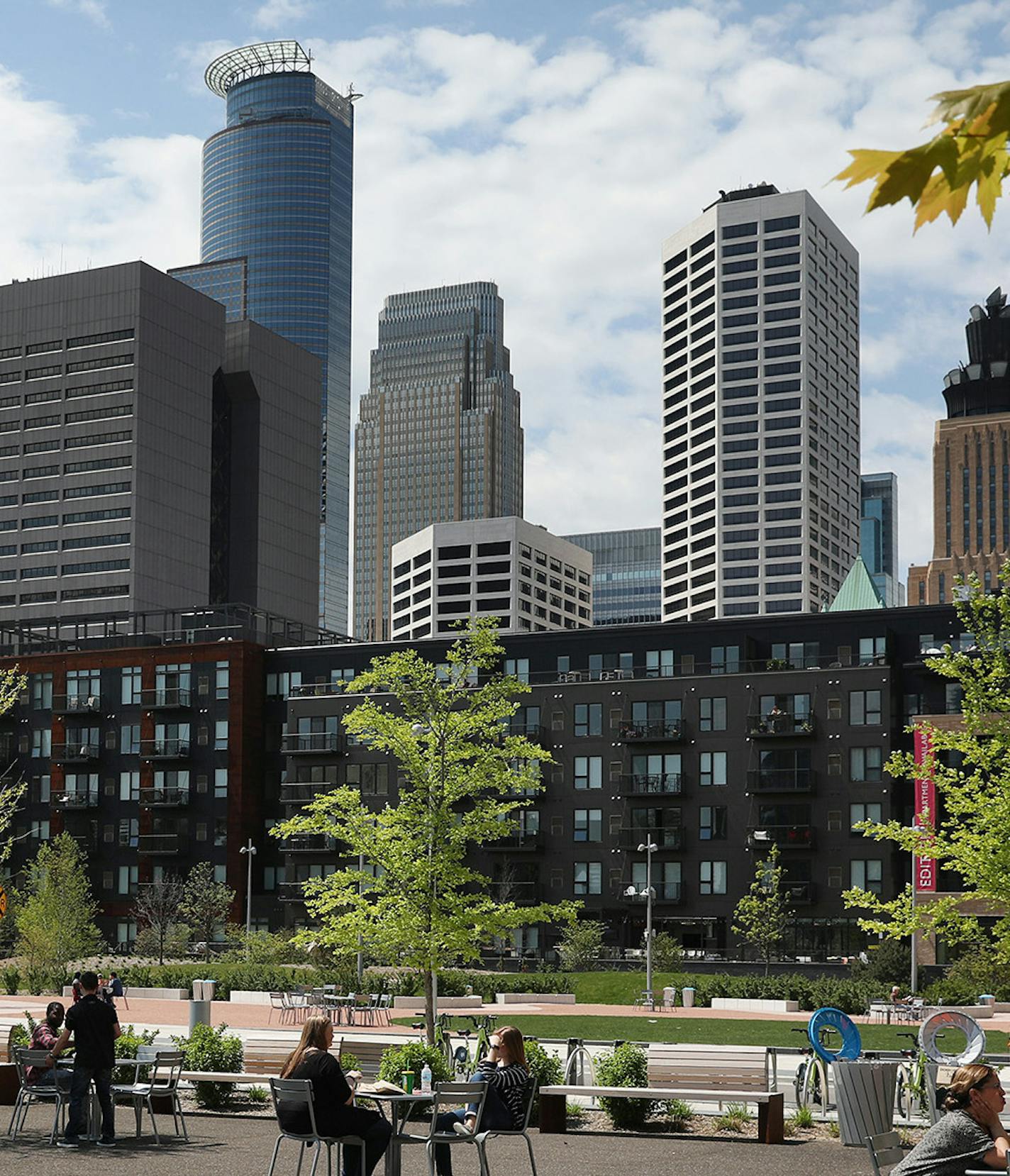 Visitors enjoyed the warm weather Friday. ] ANTHONY SOUFFLE &#xef; anthony.souffle@startribune.com Visitors enjoyed the warm weather Friday, May 12, 2017 at Downtown East Commons in Minneapolis. The park opened nearly a year ago, but this is the first summer that visitors will be able to take full advantage of the downtown Minneapolis park. Green Minneapolis, the nonprofit conservancy that manages Downtown East, has planned a season's worth of daily and one-time attractions including classes and