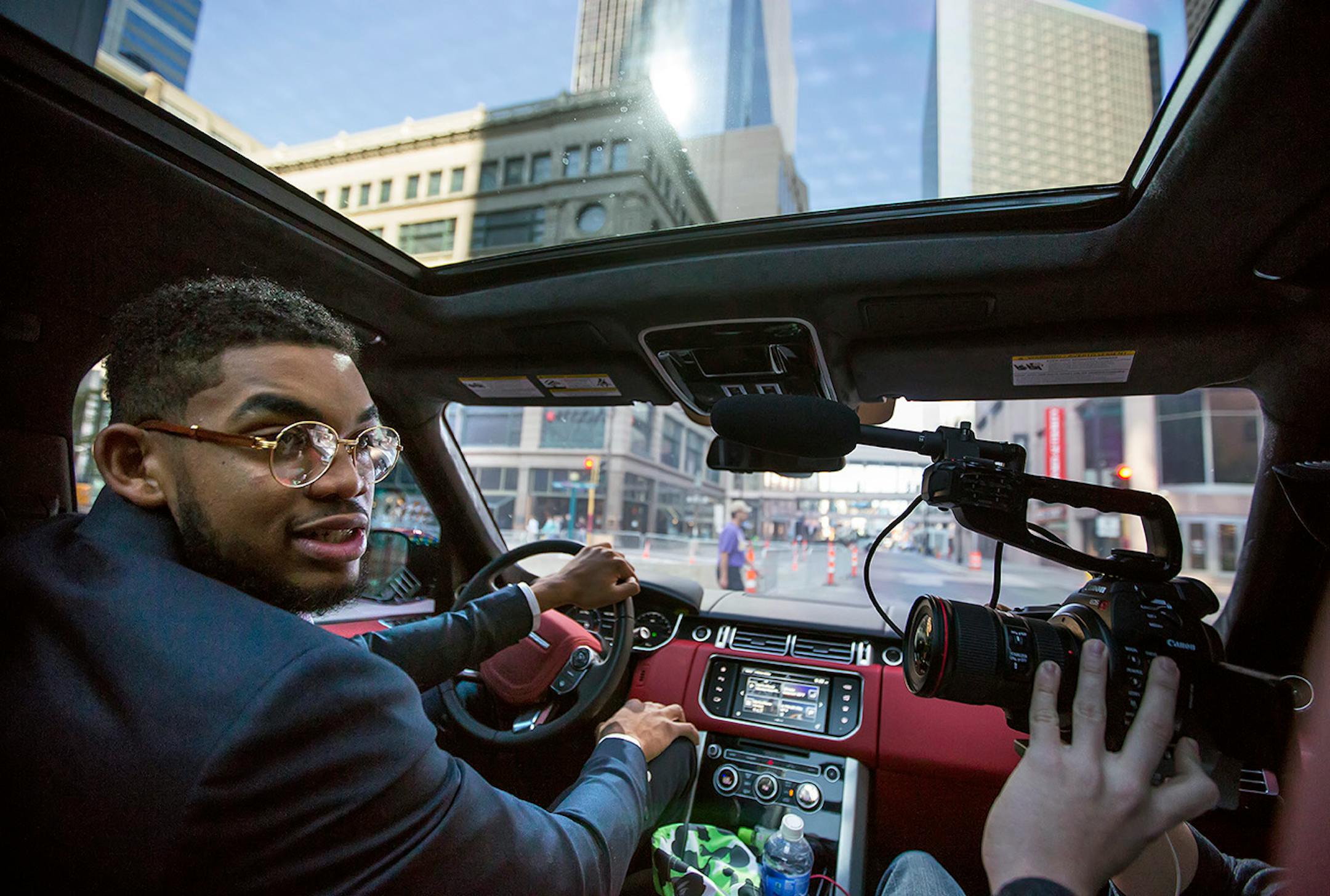 Karl-Anthony Towns drives his Range Rover in downtown Minneapolis and is video taped by the NBA (Bennett Snyder) on his way to Target Center for the announcement of his award as NBA Rookie of the Year. ] A day in the life of Karl-Anthony Towns before and after his Rookie of the Year day.