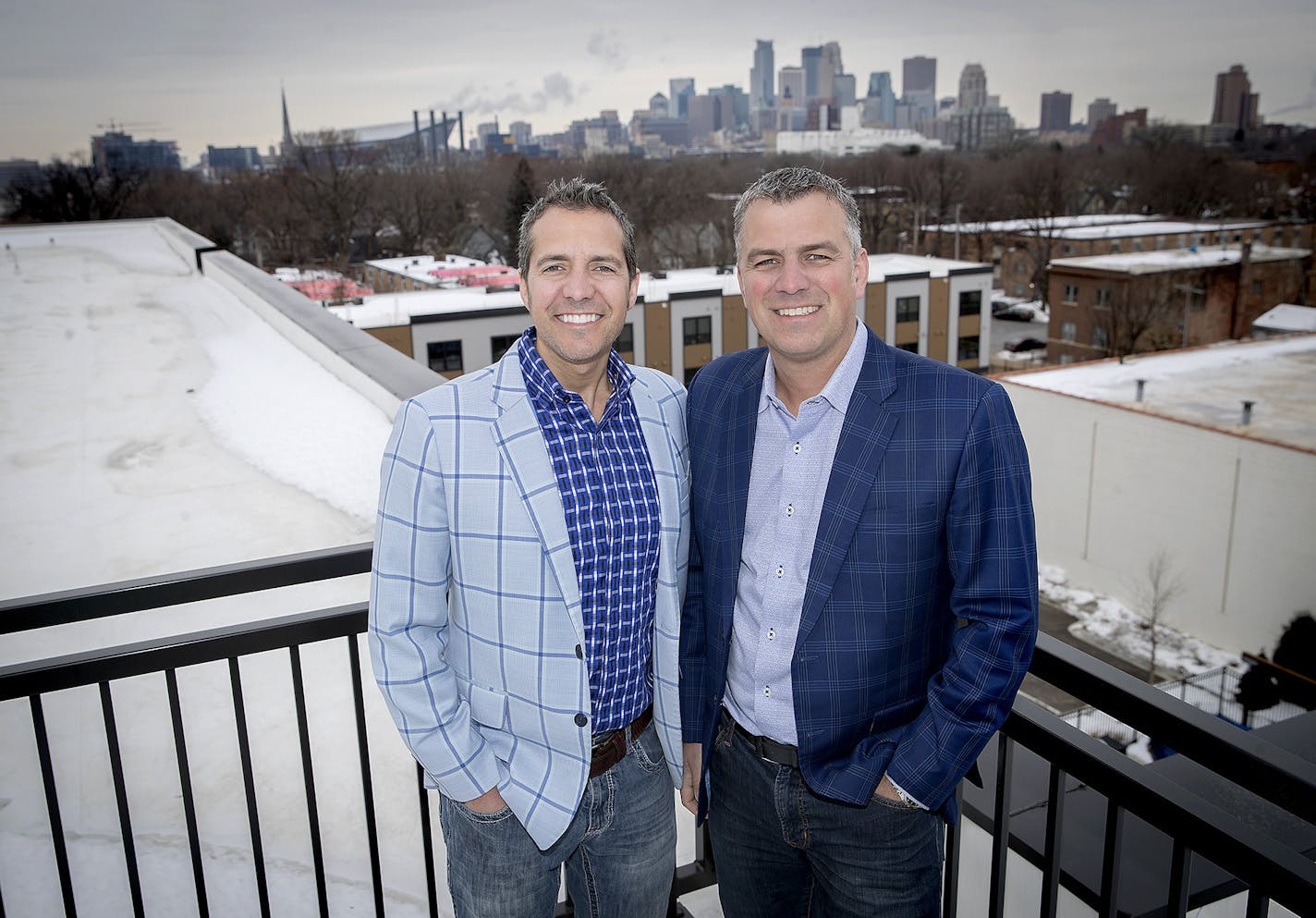 Developers Kent and Brian Roers braved the elements to stand atop Spectrum Apartments, their affordable apartment project near downtown Minneapolis, Tuesday, January 30, 2018. ] ELIZABETH FLORES &#xef; liz.flores@startribune.com