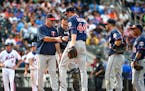 Minnesota Twins manager Paul Molitor takes the ball from starting pitcher Kyle Gibson (44) after Gibson loaded the bases in the sixth inning of a base