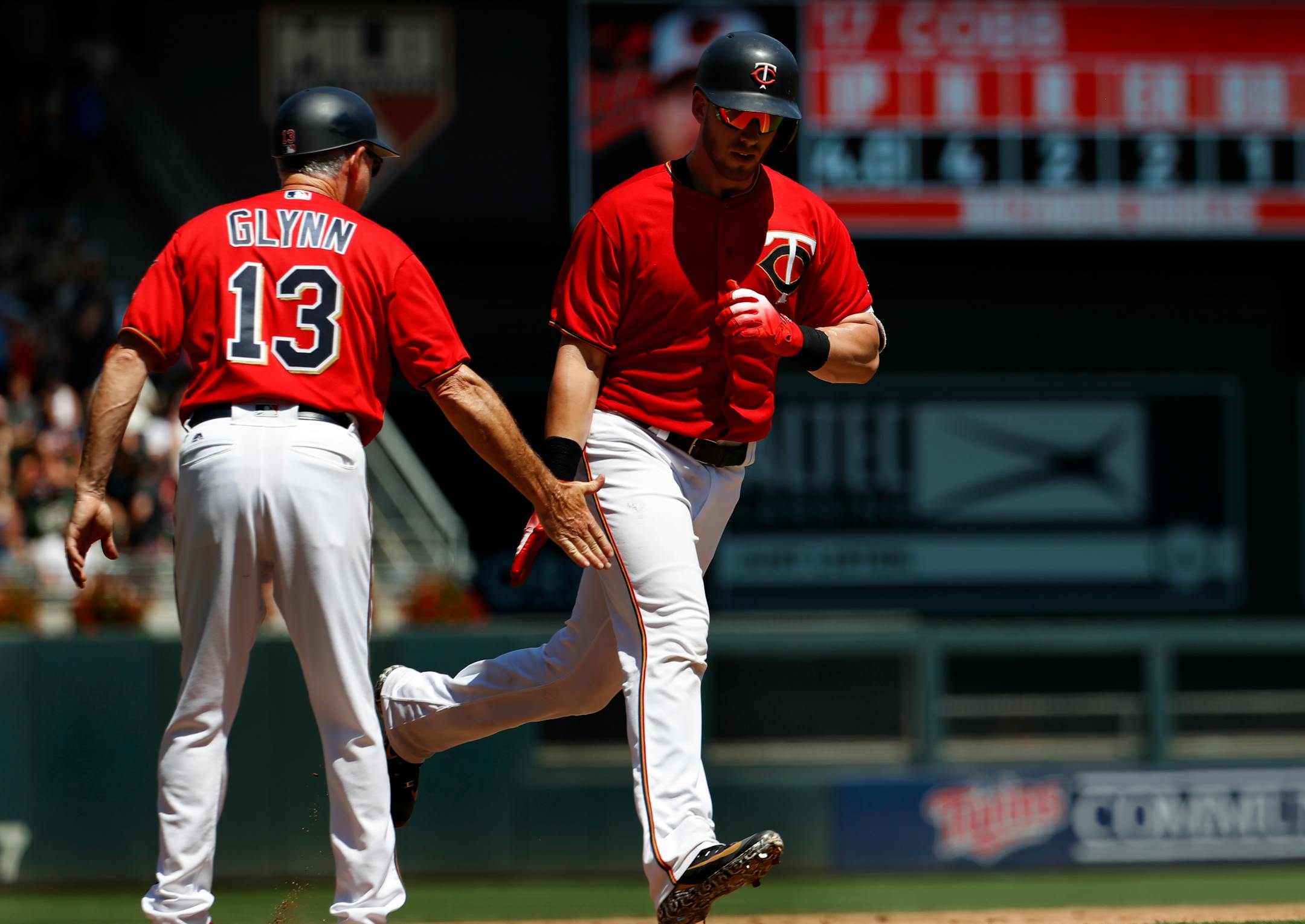 The Twins' Mitch Garver rounded the bases and slapped hands with third base coach Gene Glynn on a two-run home run off Orioles pitcher Alex Cobb in the fifth inning Sunday. The Twins won 10-1.