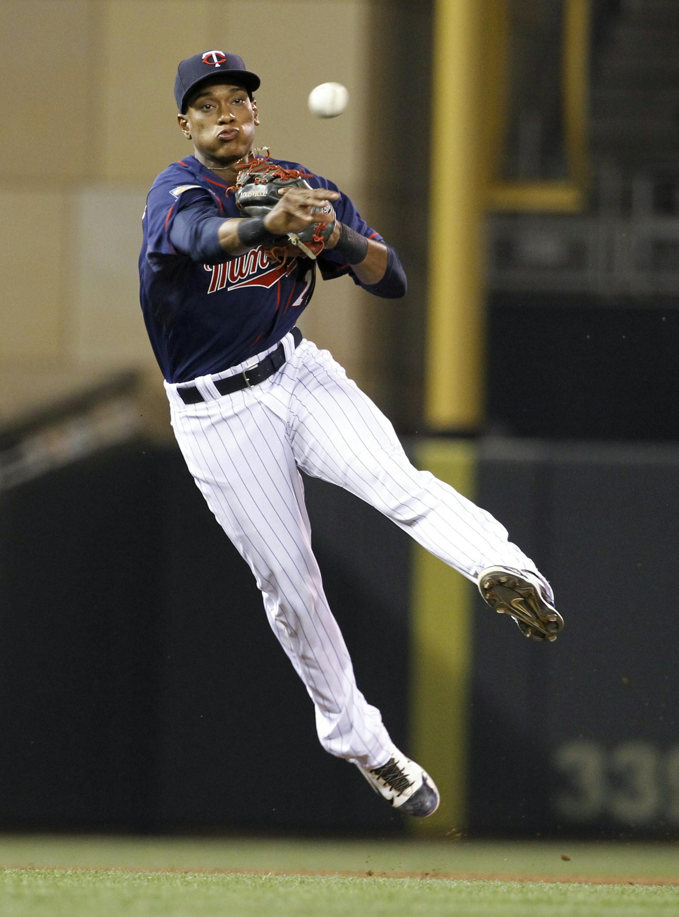 Minnesota Twins shortstop Jorge Polanco throws out Chicago White Sox's Gordon Beckham at first base on a ground ball during the eighth inning of a baseball game in Minneapolis, Friday, July 25, 2014. The White Sox won 9-5. (AP Photo/Ann Heisenfelt)