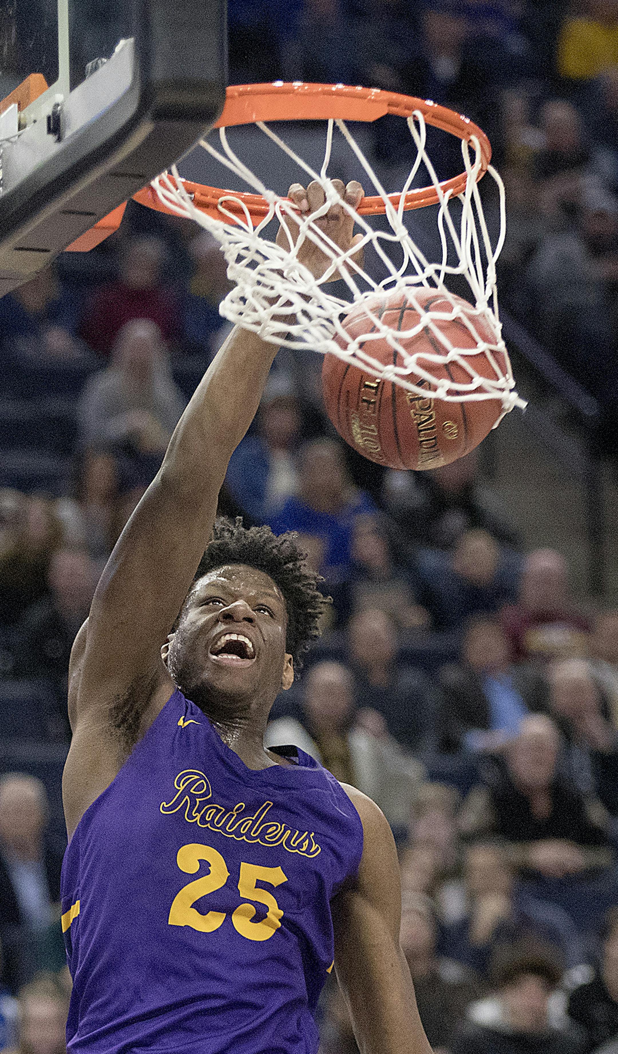 Cretin-Derham Hall's Daniel Oturu went up for a dunk as they took on Wayzata during the first half in a Class 4A quarterfinal at Target Center, Wednesday, March 21, 2018 in Minneapolis, MN. ] ELIZABETH FLORES ï liz.flores@startribune.com