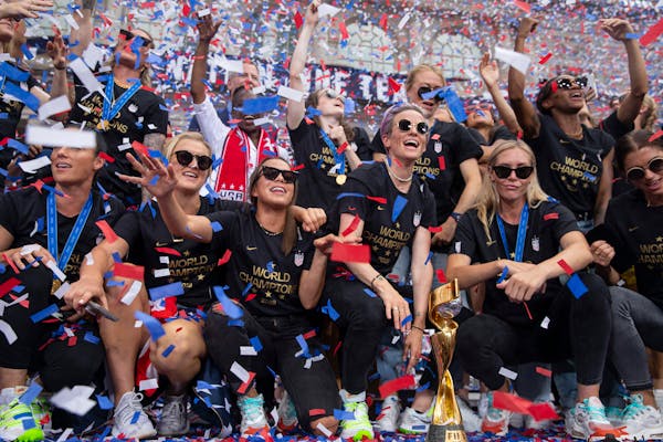 The World Cup-winning U.S. women's national soccer team (shown at City Hall after their celebratory parade in New York) will play at St. Paul's Allian