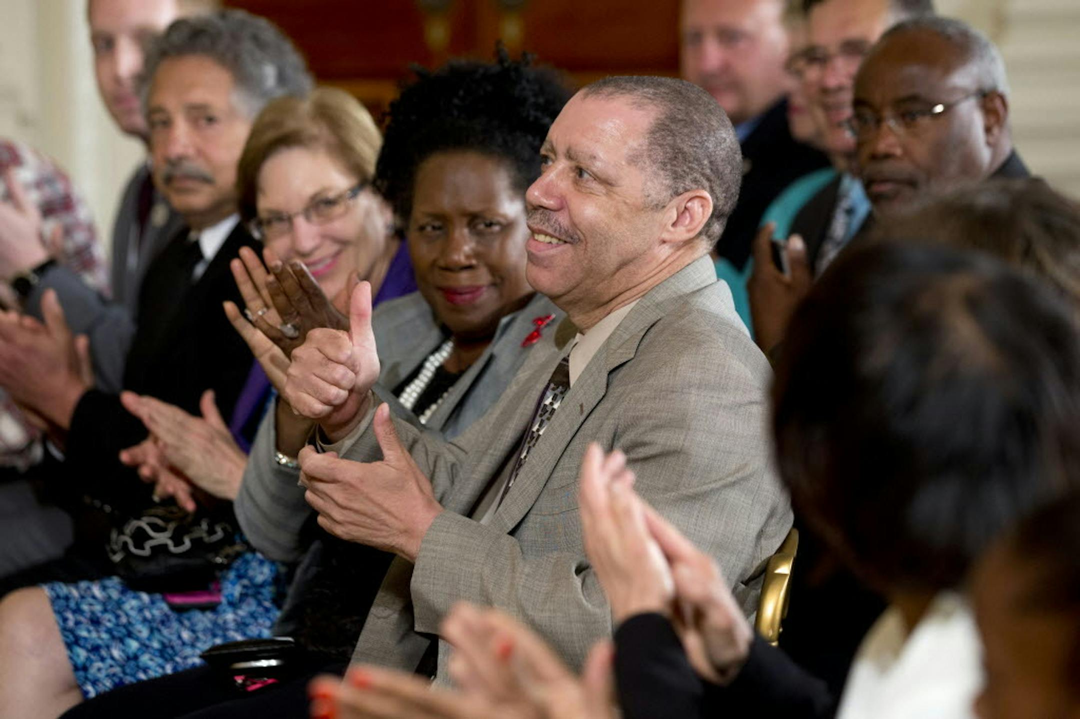 June 4, 2014: Vietnam veteran Doran Hocker as he is acknowledged by first lady Michelle Obama during the Joining Forces initiative event announcing "The Mayors Challenge to End Veteran Homelessness" program, in the East Room of the White House in Washington.