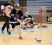 Dakota United won 4-2 over North Suburban during the adapted floor hockey CI championships at Bloomington Jefferson High Saturday, March 14, 2015, in 