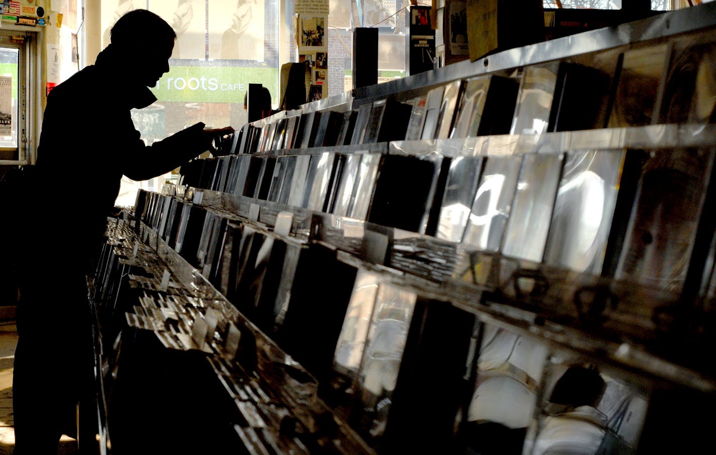 Ali Haupt * ahaupt@startribune.com - 3/28/2008 - Minneapolis, MN - St. Louis Park resident Mark Dean browses music Friday at Treehouse Records on Lyndale Avenue S. in Minneapolis.