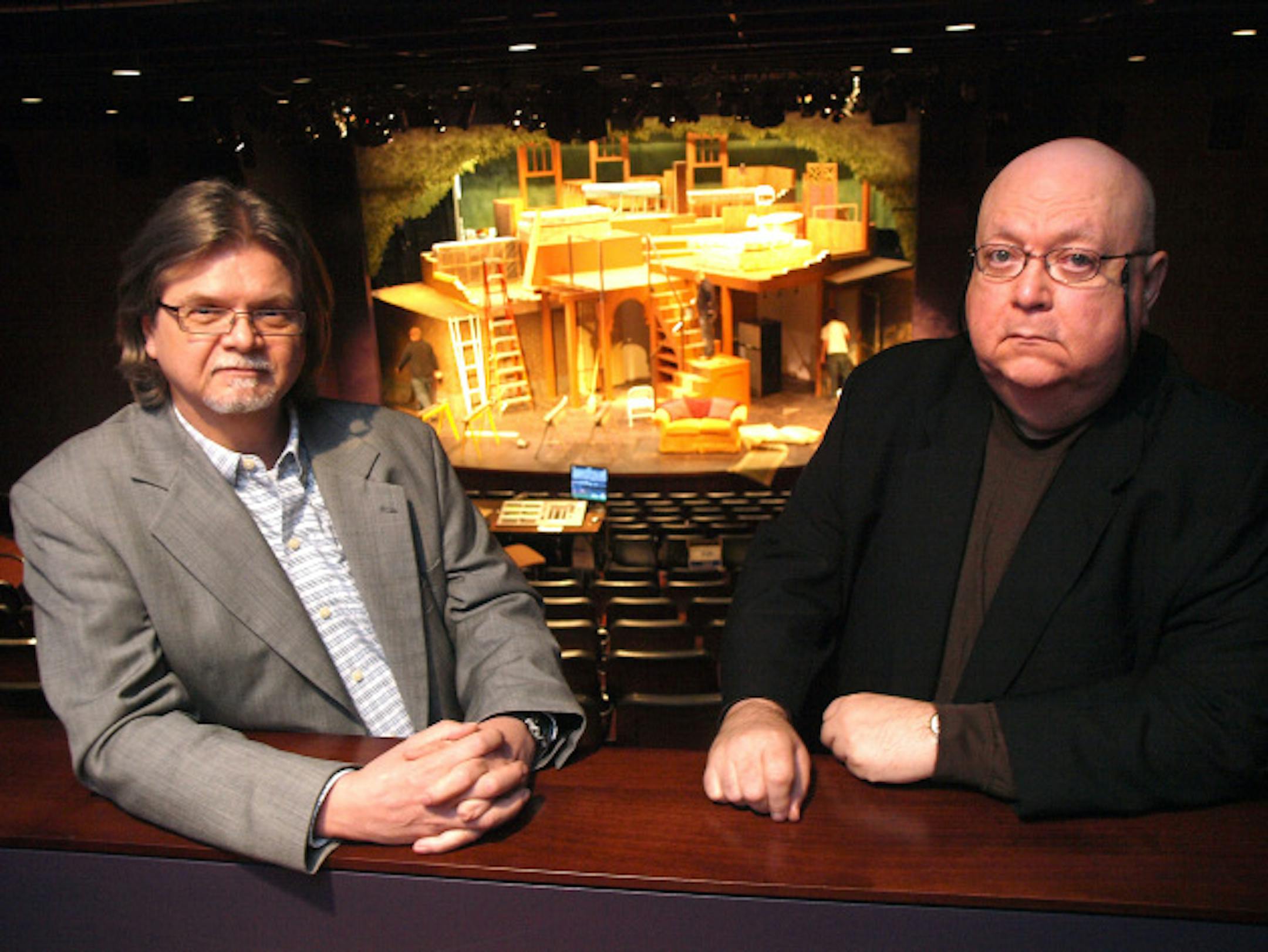 Park Square Theatre artistic director Richard Cook and executive director Steven Kent Lockwood are celebrating the theatre's 35th anniversary. They are pictured in an updated auditorium as the set for current production "The Last Seder" glows behind them. Photo by Brad Stauffer
