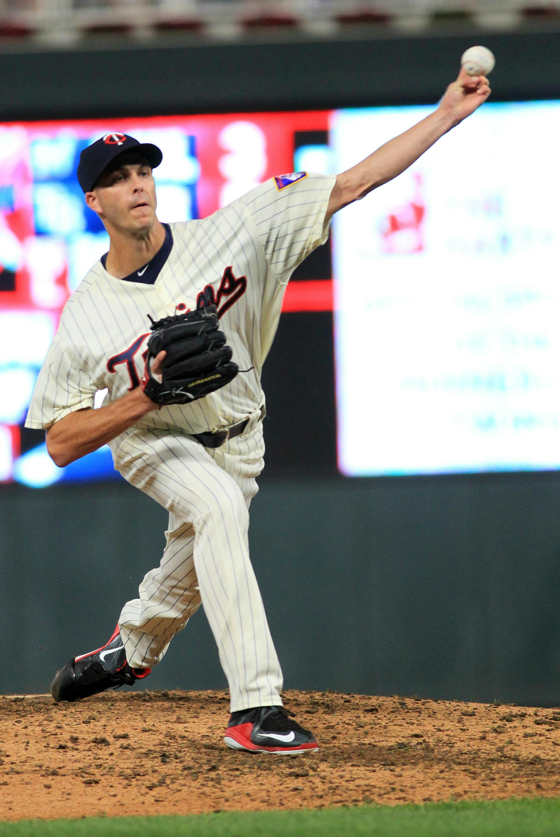 Minnesota Twins pitcher Taylor Rogers (55) throws in the ninth inning against Texas Rangers during a baseball game Saturday, Aug. 5, 2017, in Minneapolis. The Rangers won 4-1. (AP Photo/Andy Clayton-King)