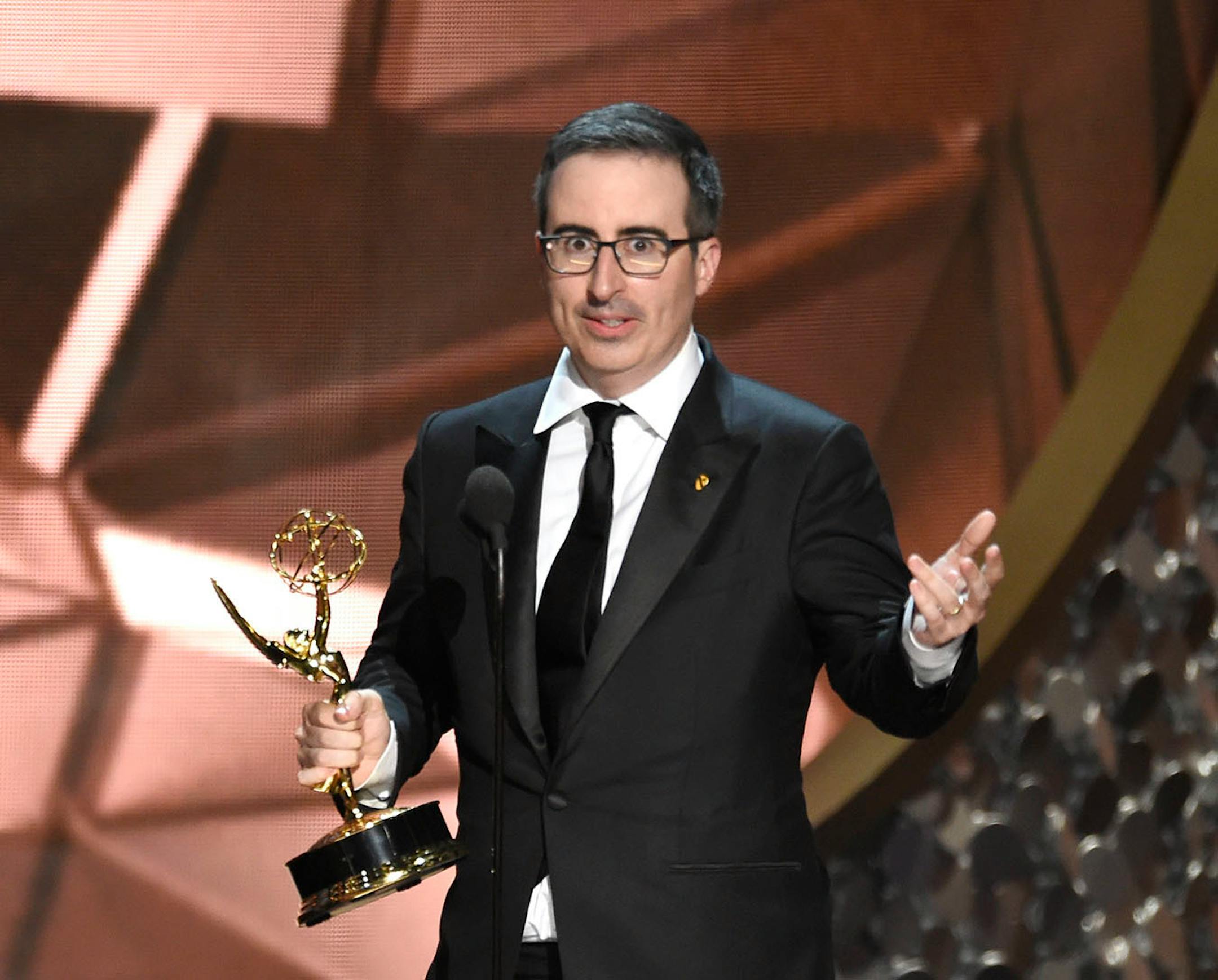John Oliver of 'Last Week Tonight with John Oliver' accept the award for outstanding variety talk series at the 68th Primetime Emmy Awards on Sunday, Sept. 18, 2016, at the Microsoft Theater in Los Angeles.