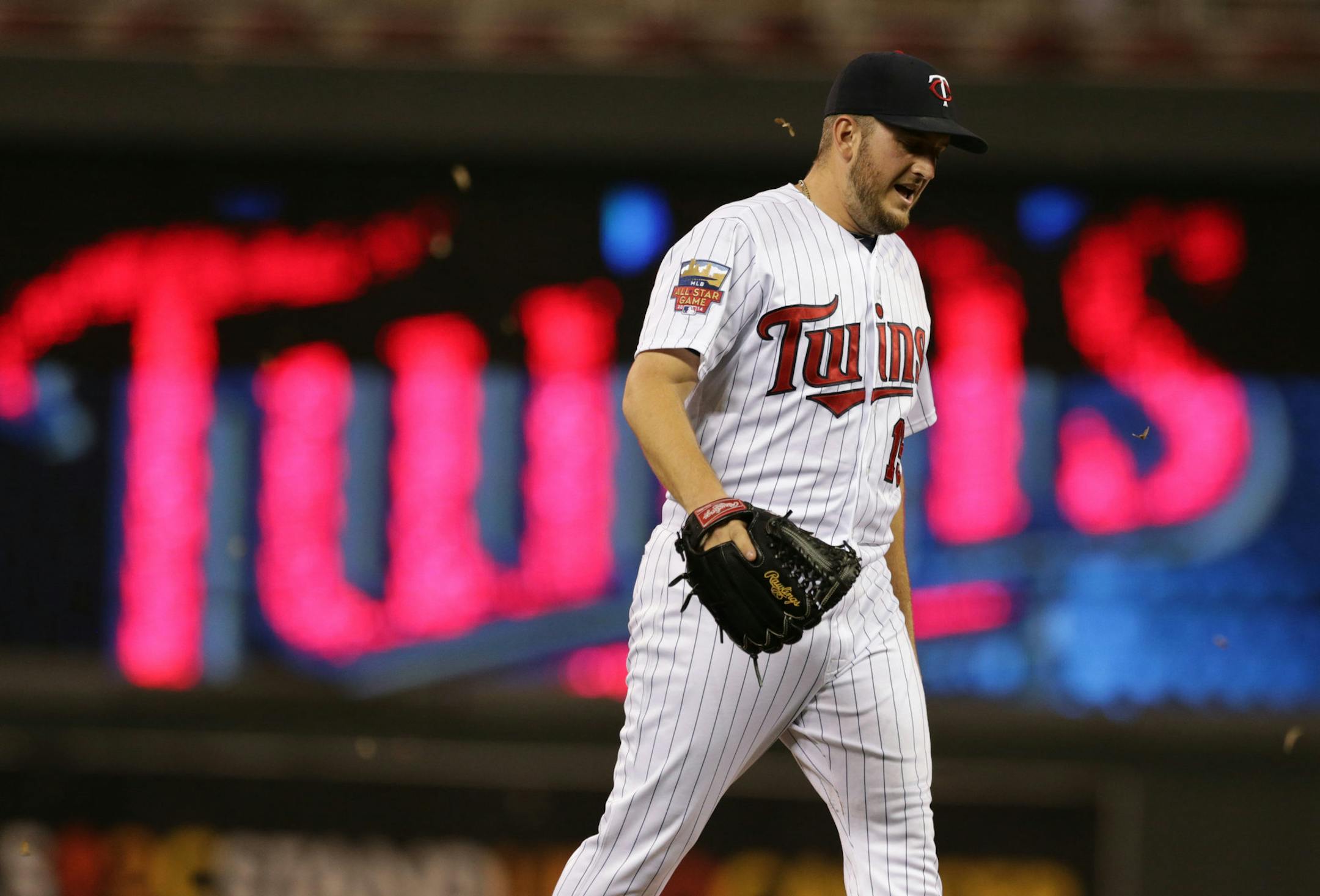 Minnesota Twins' pitcher Glen Perkins celebrates the Twins 4-2 win over the CHicago WHite Sox in a baseball game, Thursday, June 19, 2014, in Minneapolis. The Twins won 4-2, with Perkins picking up the save. (AP Photo/Jim Mone) ORG XMIT: MIN2014070621131146