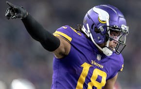 Justin Jefferson (18) of the Minnesota Vikings reacts after a first down catch in the second quarter Thursday, November 24, 2022, at U.S. Bank Stadium