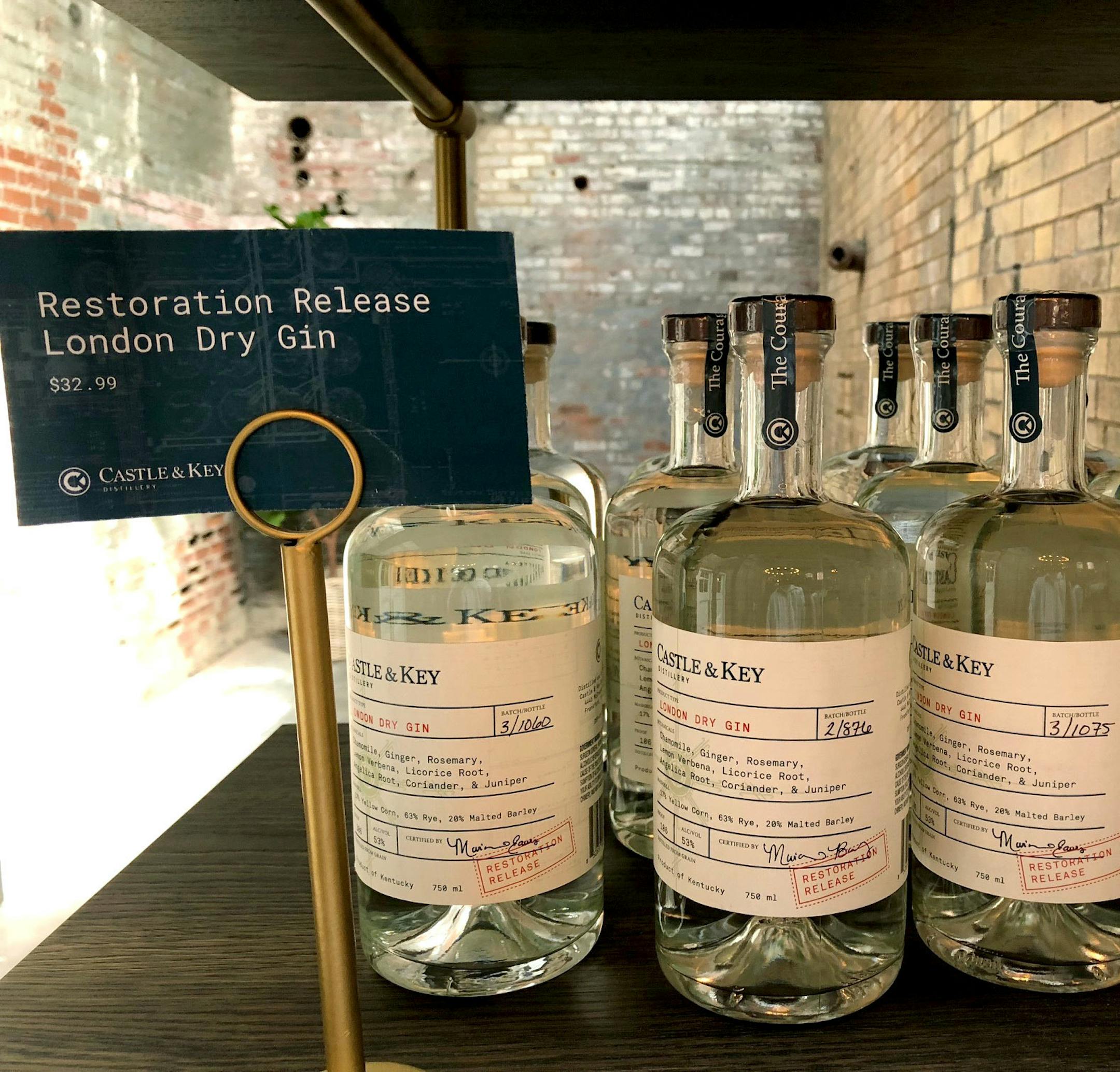 In this Friday, Sept. 14, 2018 photo, bottles of gin produced at Castle & Key Distillery are displayed for sale at the distilleryís gift shop in Millville, Ky. Spirits production resumed at the famed distilling site in late 2016, but the new brandís bourbon wonít reach consumers until around 2021. (AP Photo/Bruce Schreiner)