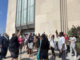 Chauntyll Allen, a St. Paul school board member and leader of Black Lives Matter Twin Cities, led a chant outside St. Paul’s City Hall after a news 