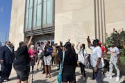 Chauntyll Allen, a St. Paul school board member and leader of Black Lives Matter Twin Cities, led a chant outside St. Paul’s City Hall after a news 