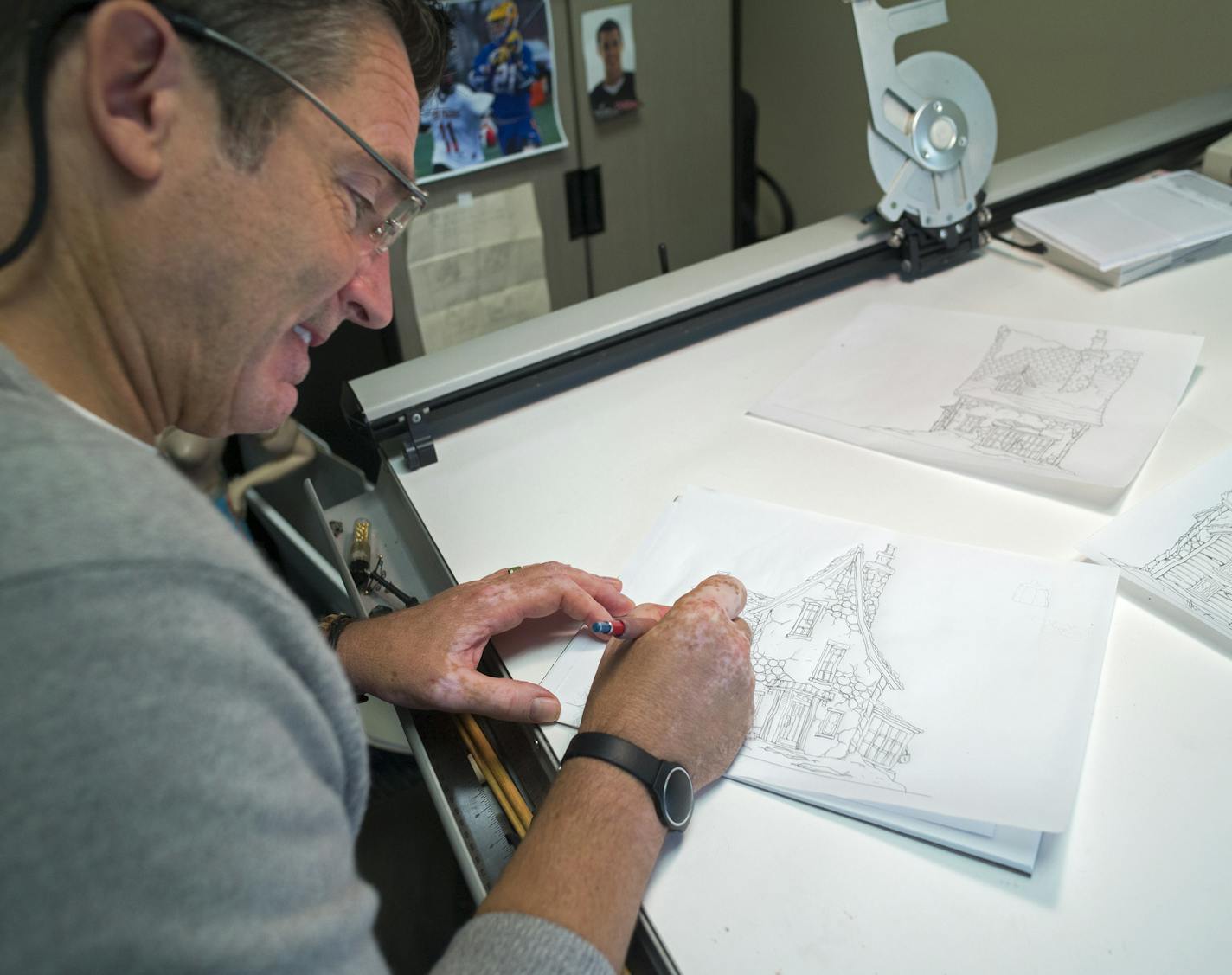 At Department 56 offices in Eden Prairie, Sr. designer Scott Enter who has been there 25 years, sketches out some ideas .] Richard Tsong-Taatarii/rtsong-taatarii@startribune.com