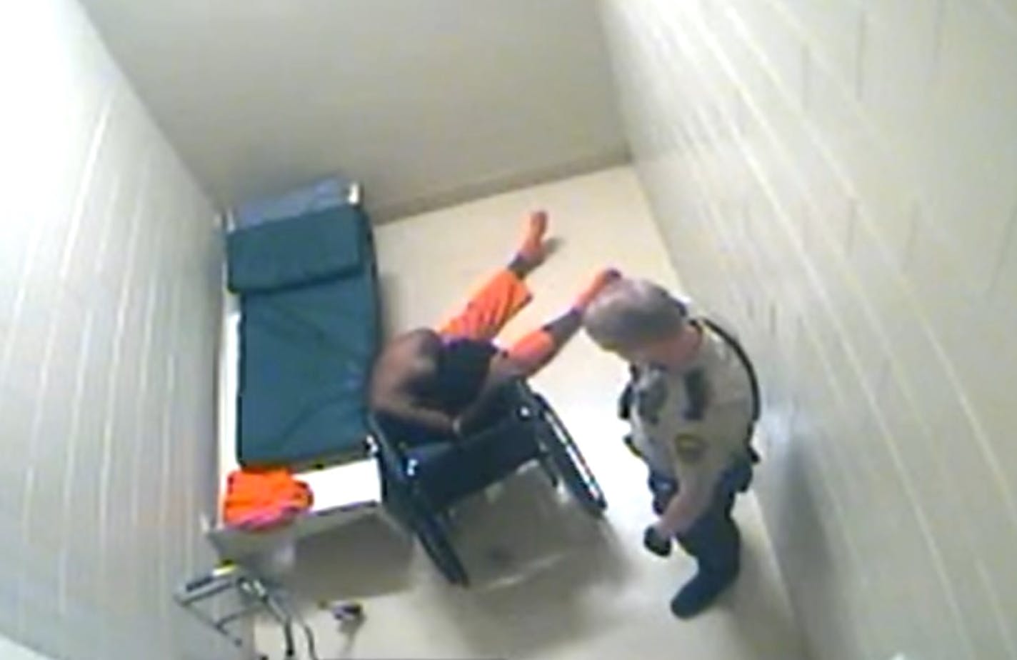 Surveillance footage shows an incapacitated Hardel Sherrell collapsing into a wheelchair as a Beltrami County Jail staffer looks on on Sept. 2, 2018. Sherrell died the following day.