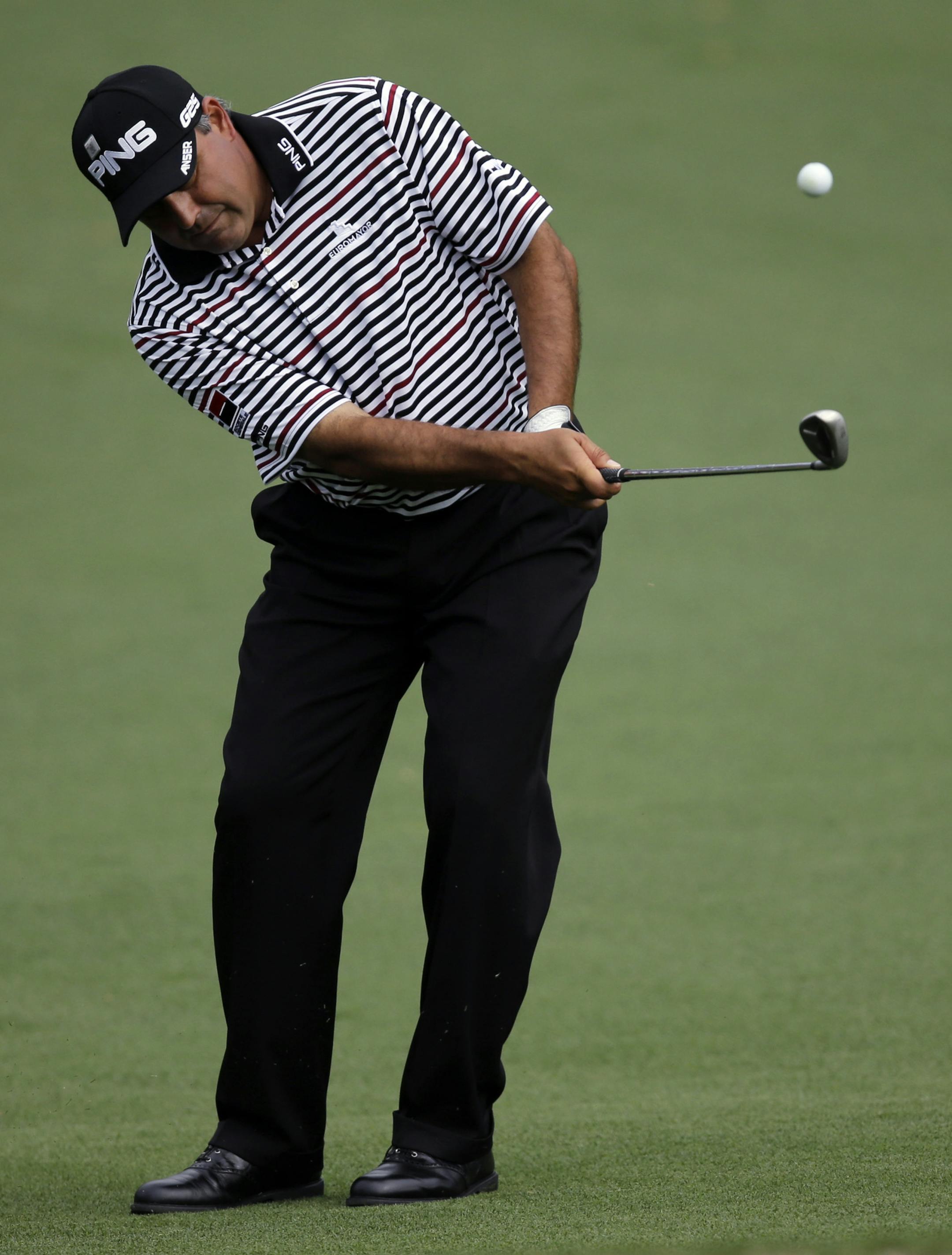 Angel Cabrera, of Argentina, chips to the second green during the second round of the Masters golf tournament Friday, April 12, 2013, in Augusta, Ga. (AP Photo/Matt Slocum)