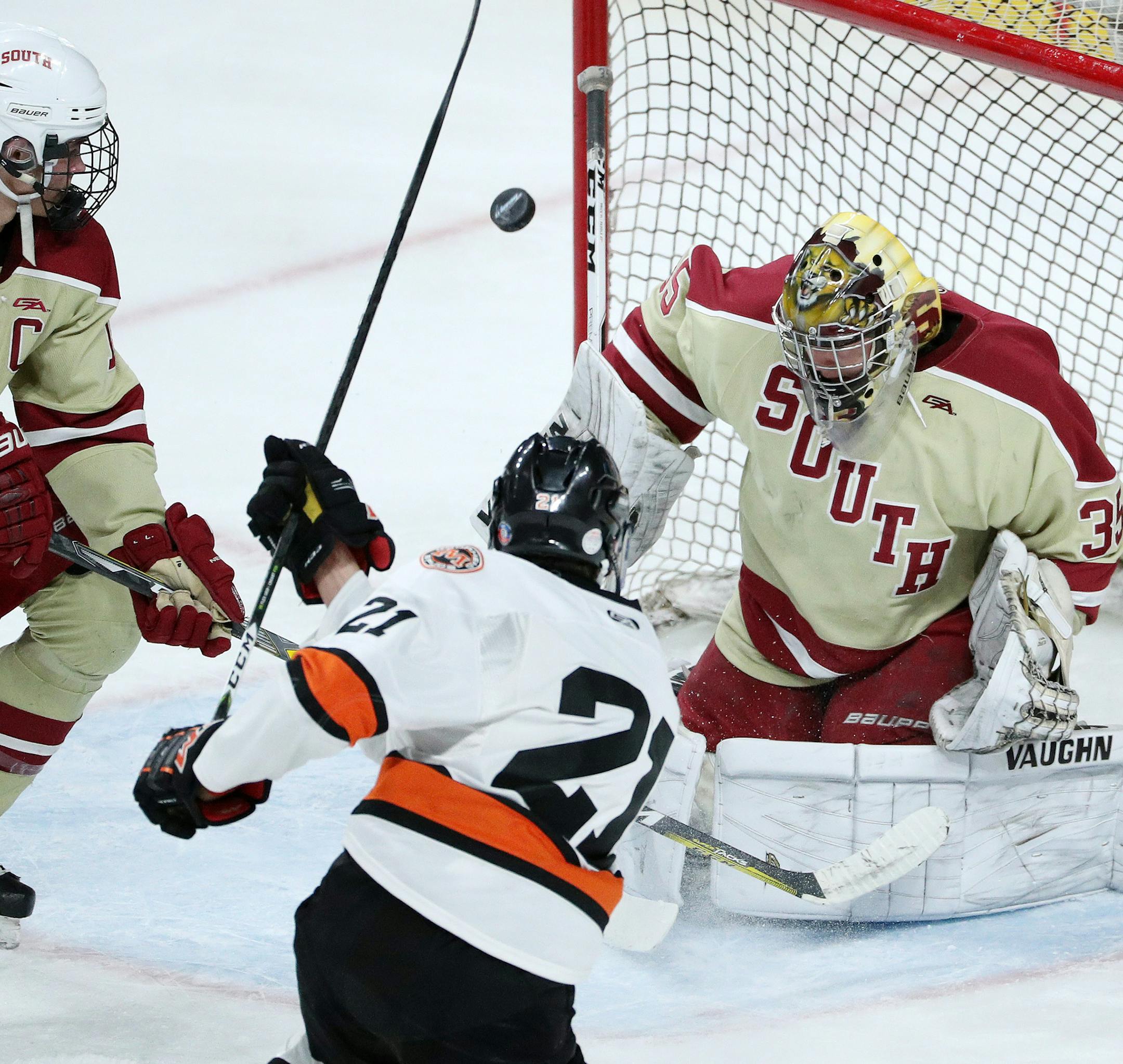 Moorhead's Jack Stetz (21) shoots wideon Lakeville South goaltender Isaiah DiLaura (35) in the second period. ] ANTHONY SOUFFLE ï anthony.souffle@startribune.com Players competed during the boys' hockey state tournament Class 2A semifinals Friday, March 10, 2017 at the Xcel Energy Center in St. Paul, Minn.