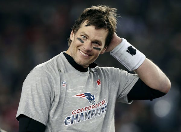 Patriots quarterback Tom Brady smiled after winning the AFC Championship 24-20 over the Jaguars on Sunday.