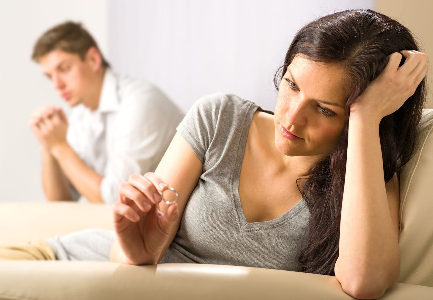 Sad wife looking at her ring after fight with husband. (Dreamstime/TNS) ORG XMIT: 1195685