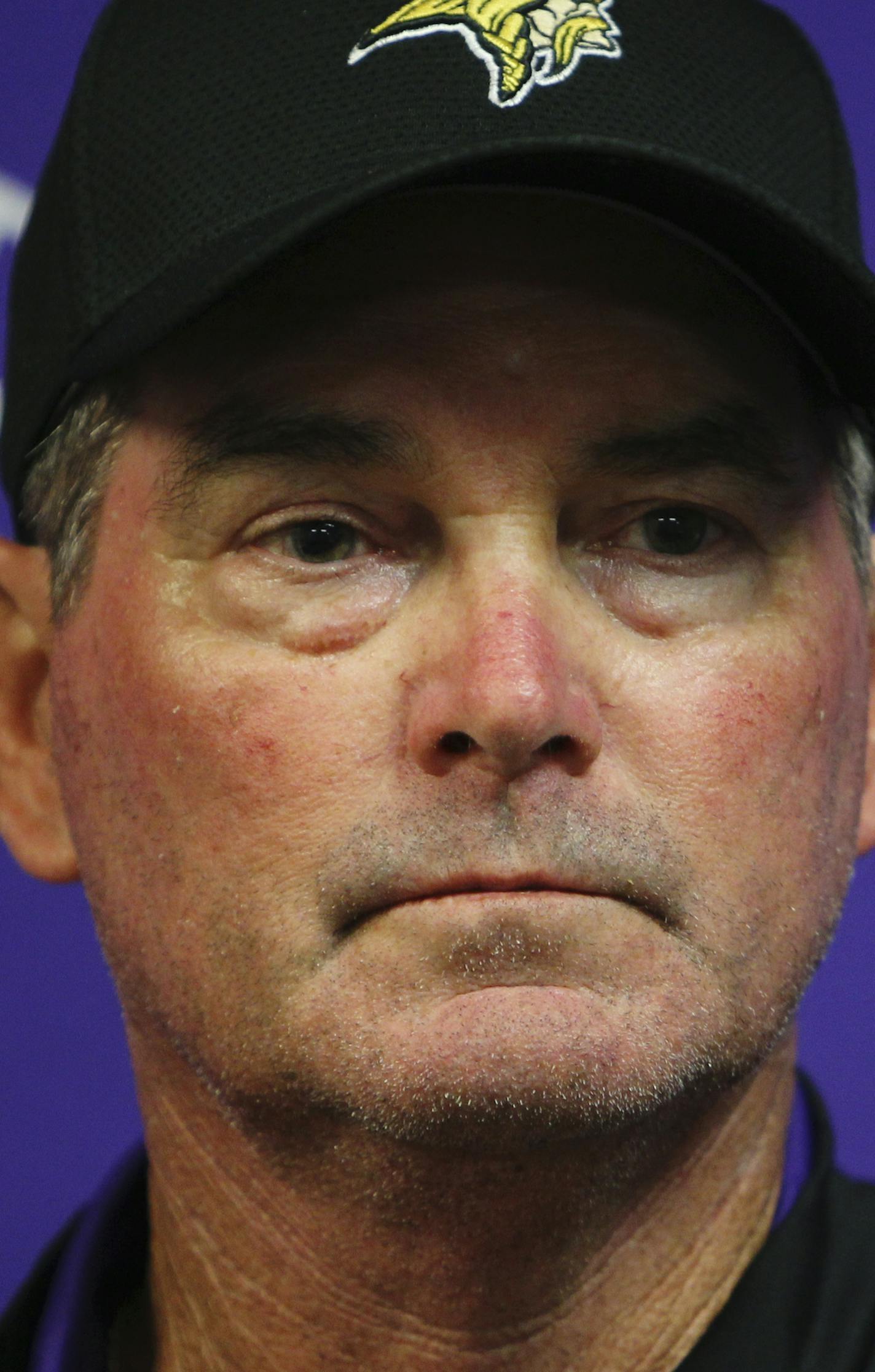 Minnesota Vikings head coach Mike Zimmer listens to a question during a news conference after a preseason NFL football game Buffalo Bills Thursday, Aug. 10, 2017, in Orchard Park, N.Y. The Vikings won 17-10. (AP Photo/Jeffrey T. Barnes)