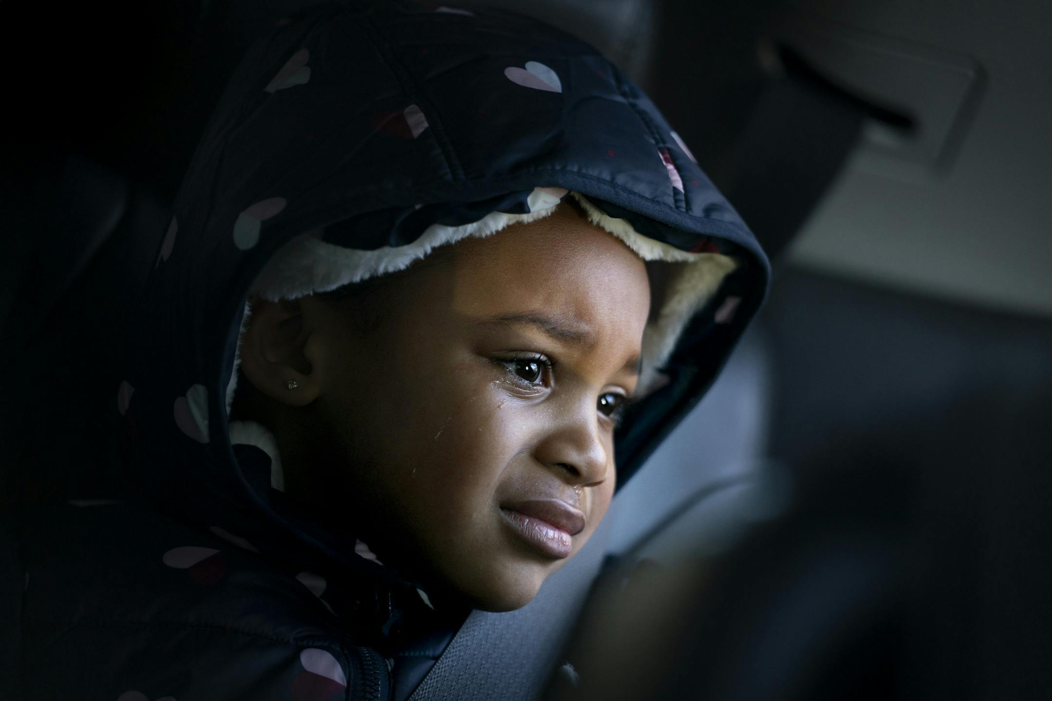 Jalei Haynes sobbed in the car after saying goodbye to her father Deonte Haynes at the airport where he left to return to Fort Hood Texas before he leaves for the Middle East where he is a helicopter mechanic for the Army National Guard on Tuesday, December 3, 2019. He had come come for a few days of Thanksgiving. ] RENEE JONES SCHNEIDER &#xa5; renee.jones@startribune.com