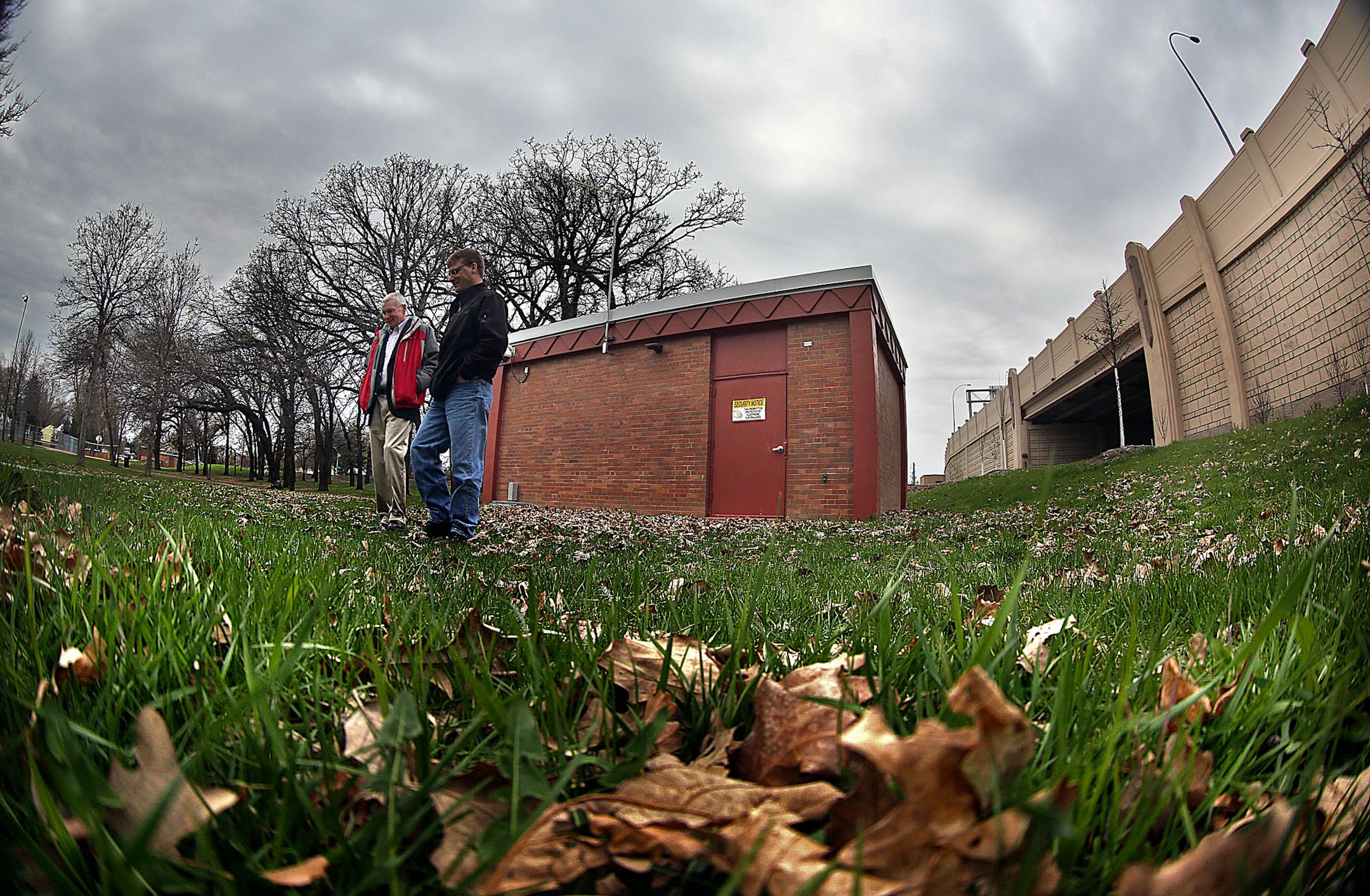 In 1962, Richfield drilled this well 437 feet into the Prairie du Chien aquifer, becoming one of the first suburbs to create a municipal water system using deep wells. Today, after more than 50 years of pumping, the water level in Richfield Well No. 1 is actually six inches higher than when it was drilled. Pictured are Robert Hintgen (dark coat), Richfield utilities supervisor, and Mike Eastling, recently retired as the city’s public works director.