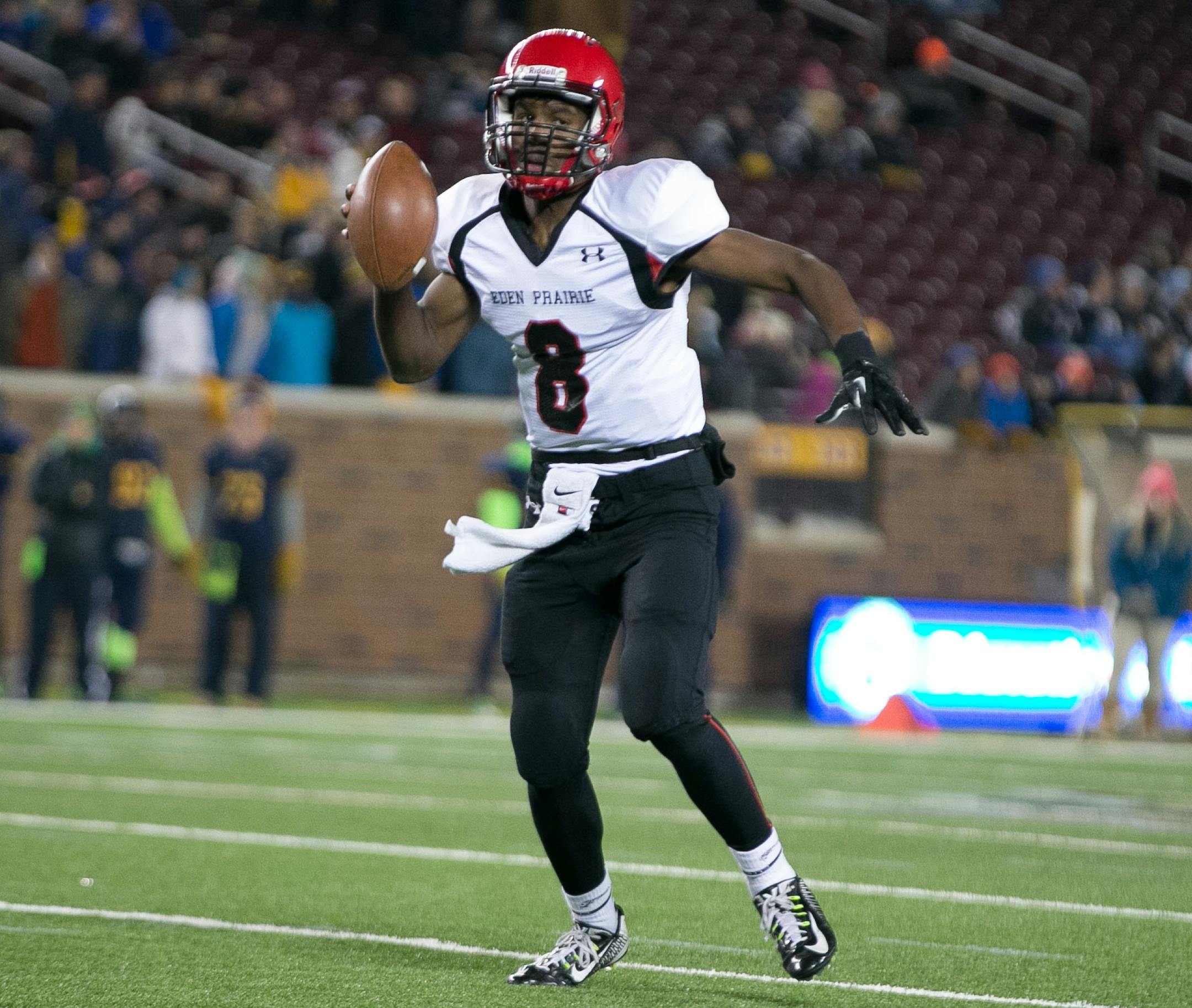 Eden Prairie quarterback Grantham Gillard looks down field for a receiver during the second quarter. ] AARON LAVINSKY • aaron.lavinsky@startribune.com Totino-Grace takes on Eden Prairie in the Class 6A Prep Bowl Friday, Nov. 21, 2014 at TCF Bank Stadium.